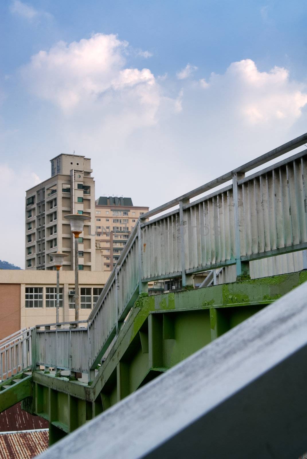 It is a beautiful cityscape contained flyover and apartment.