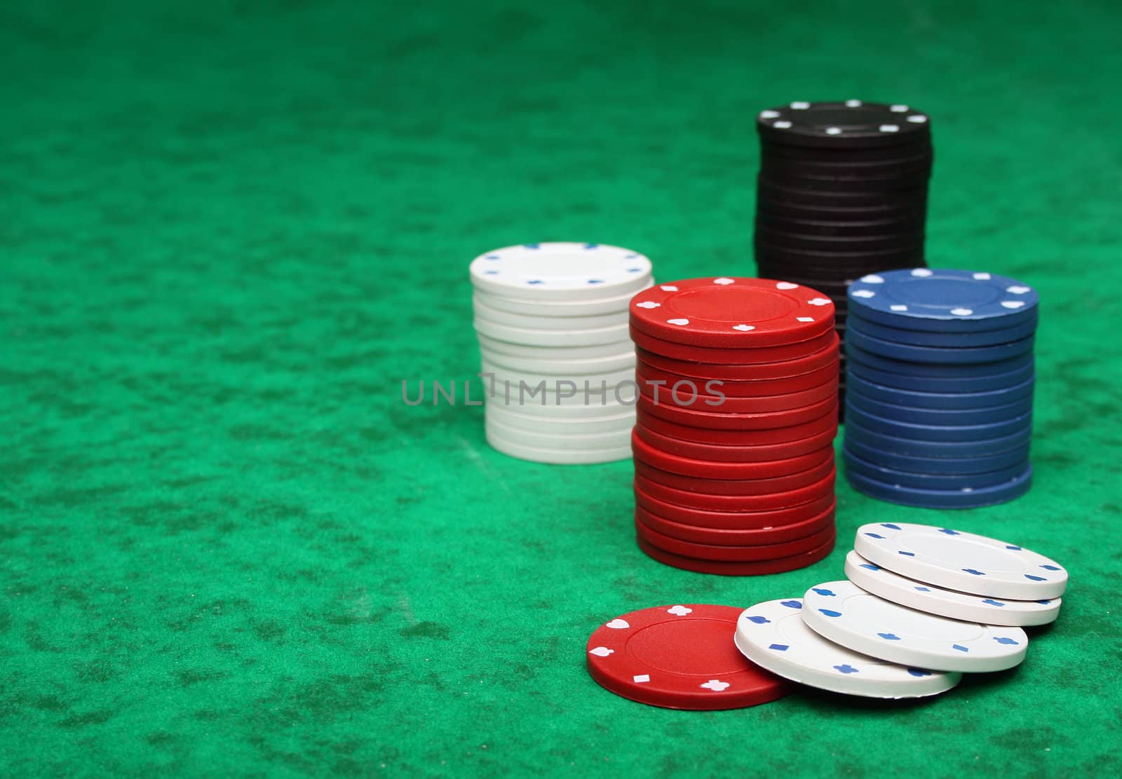 Gambling chips over green felt by Erdosain