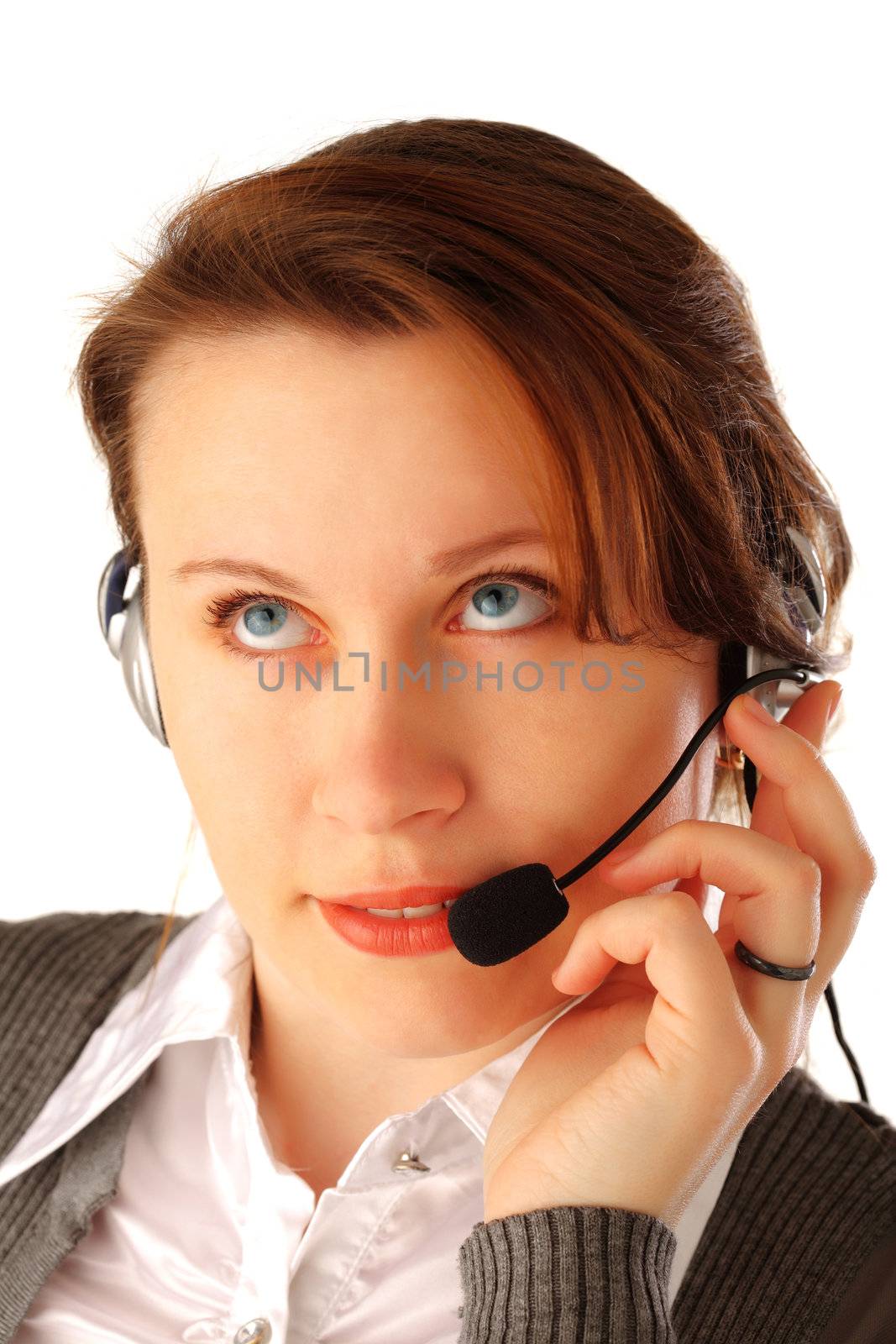 Closeup portrait of a young beautiful call centre executive with headset looking up, isolated over white background