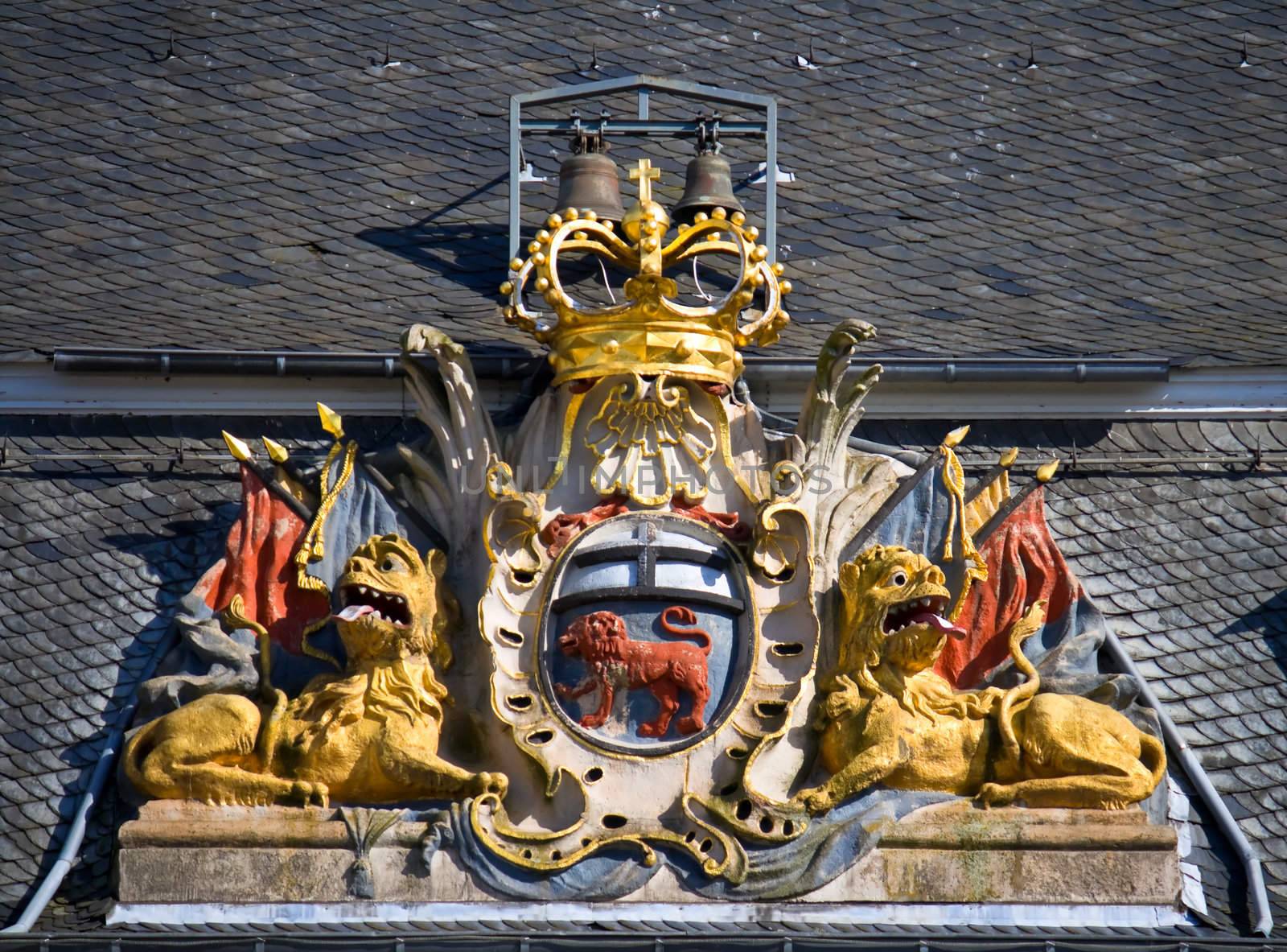 Stylized former coat-of-arms of the German city Bonn. Detail on the town-hall facade.