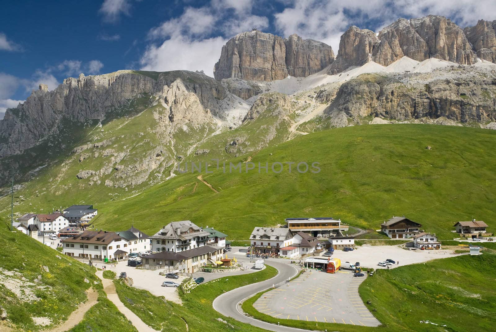summer view of Pordoi pass dominated by Sella mout, Trentino, Italy