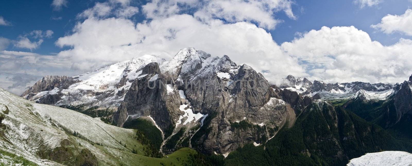 summer snow in Marmolada, famous dolomites mountain, Trentino, Italy. Photo taken with polarizer filter