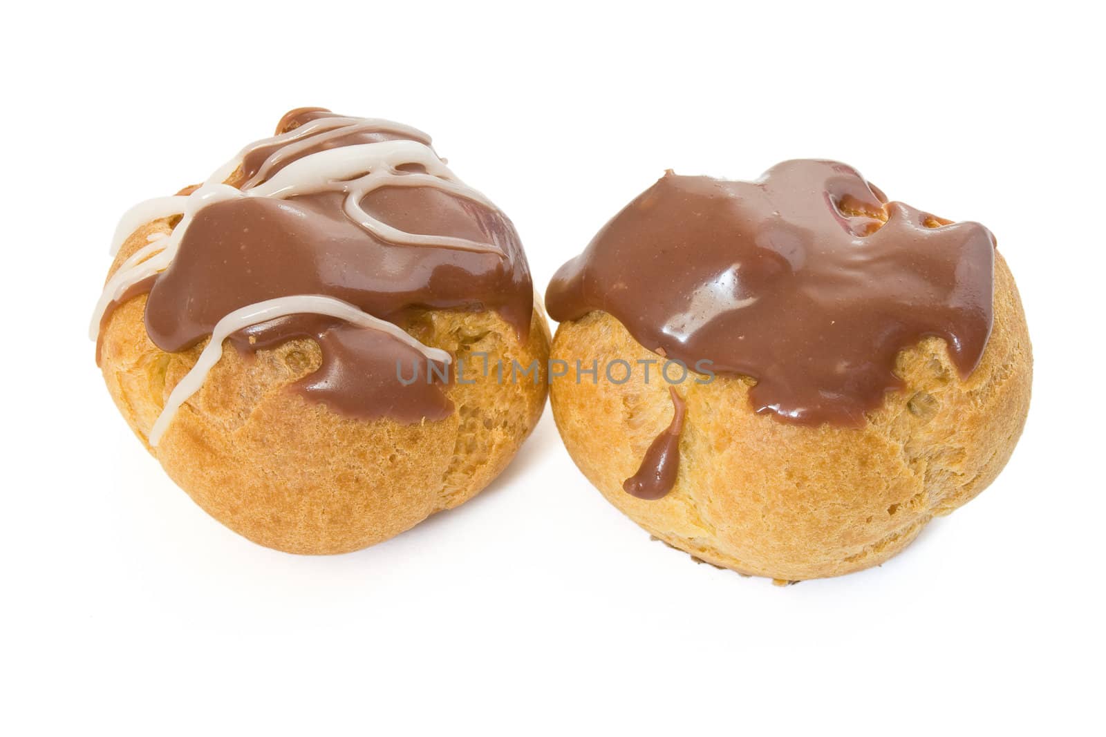 two chocolate and nut  puff pastry isolated on white background