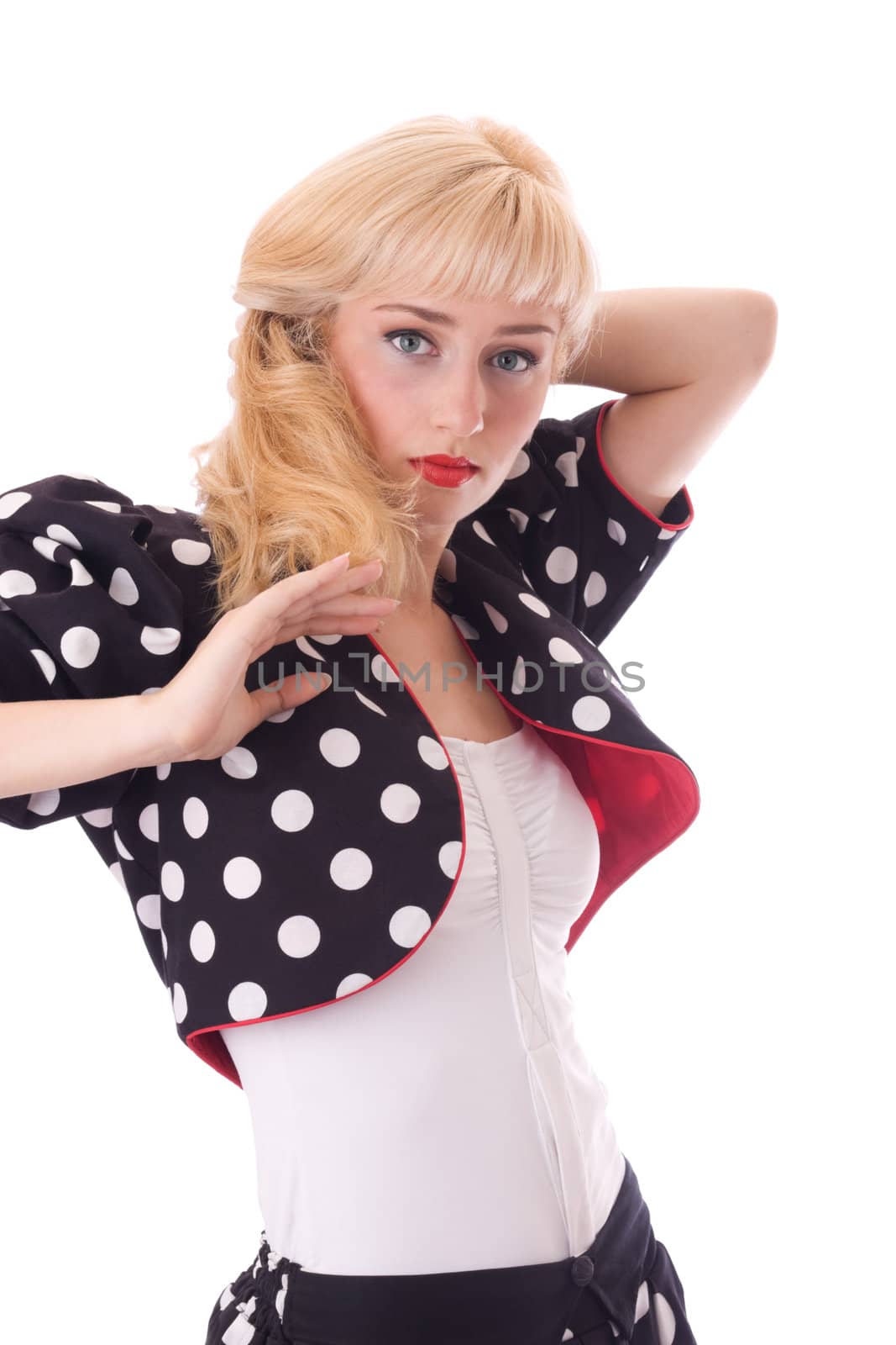 Attractive young woman in Polka dot coat