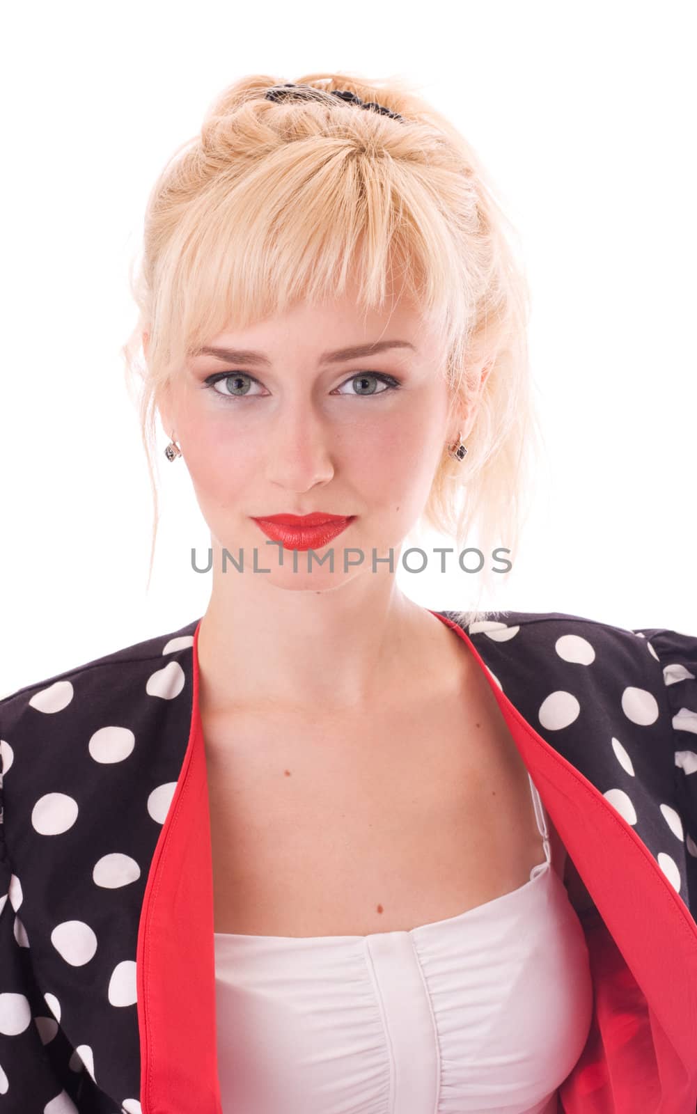 Young woman in Polka dot coat by rozhenyuk