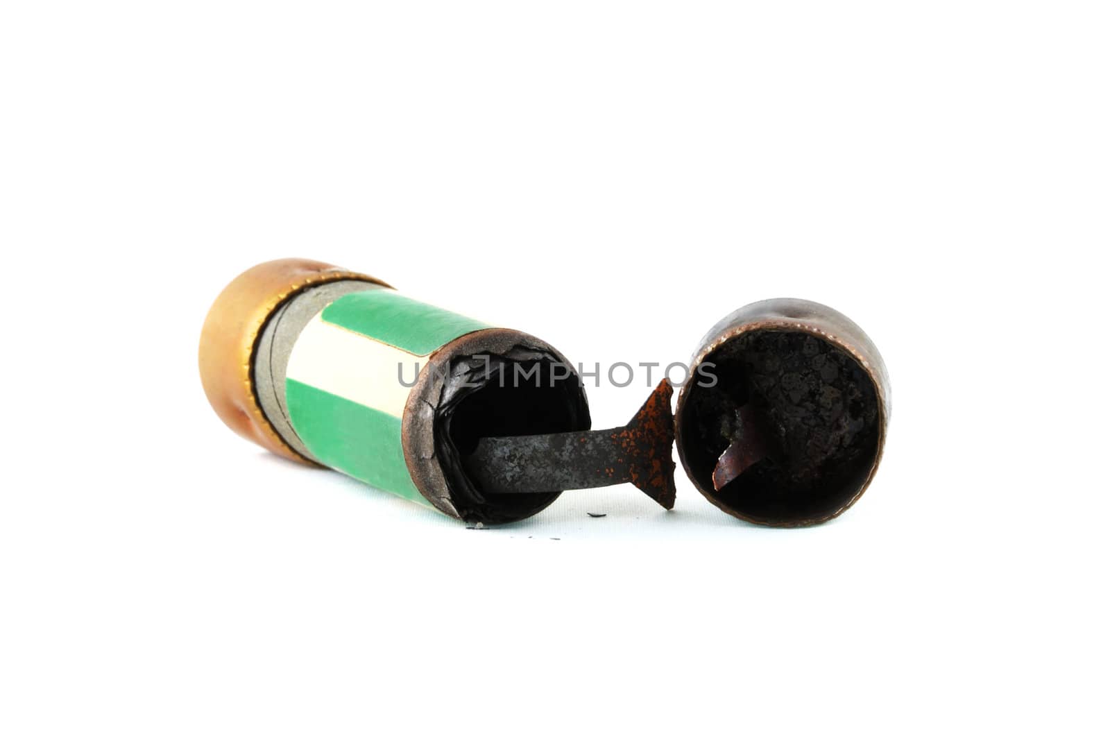 Blown fuse broken in two pieces isolated over white background.
