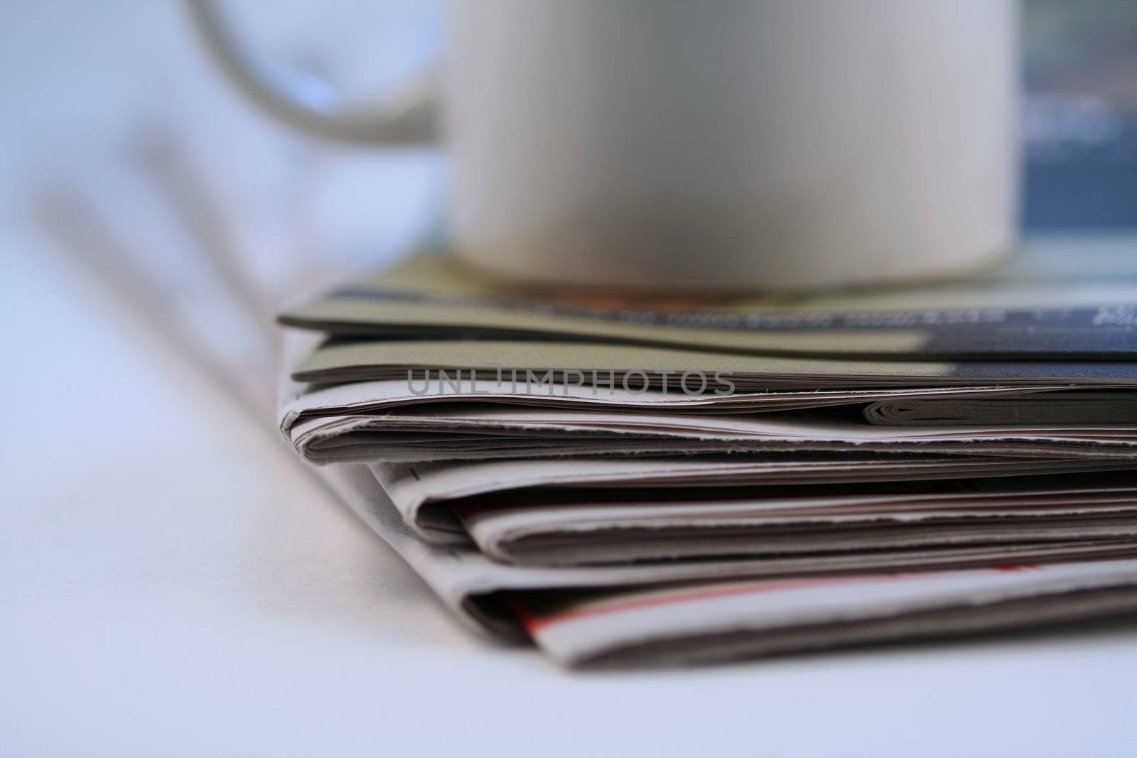 Stack of newspaper to read in the morning