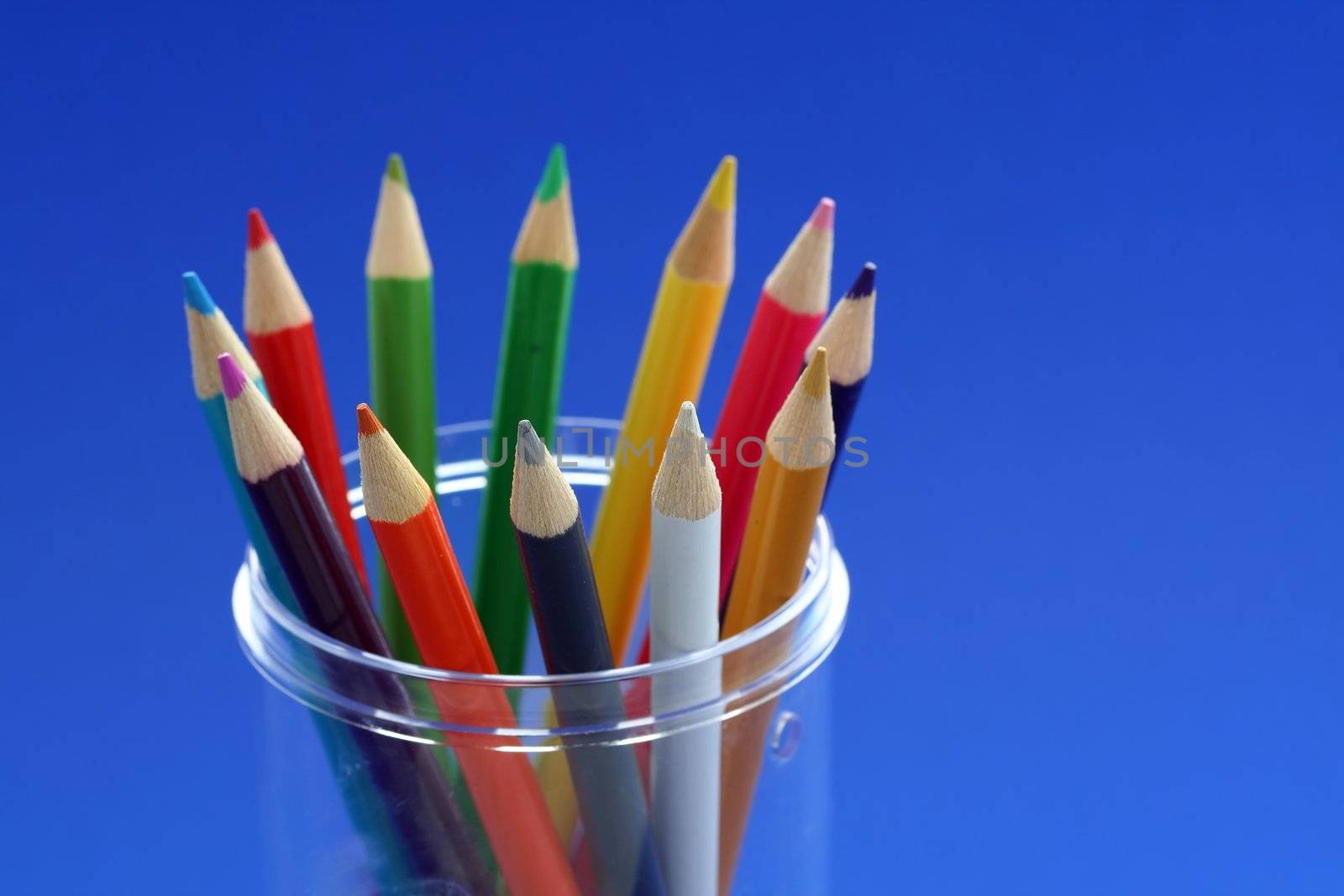 Bunch of pencil colors in a pencil holder