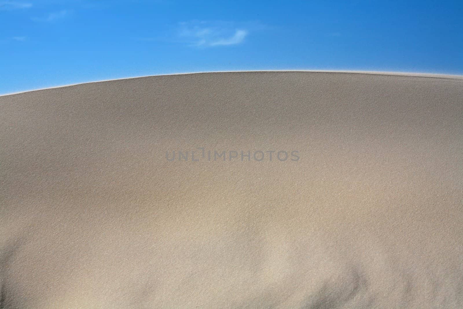 Sand dunes with a nice blue sky and white clouds! 