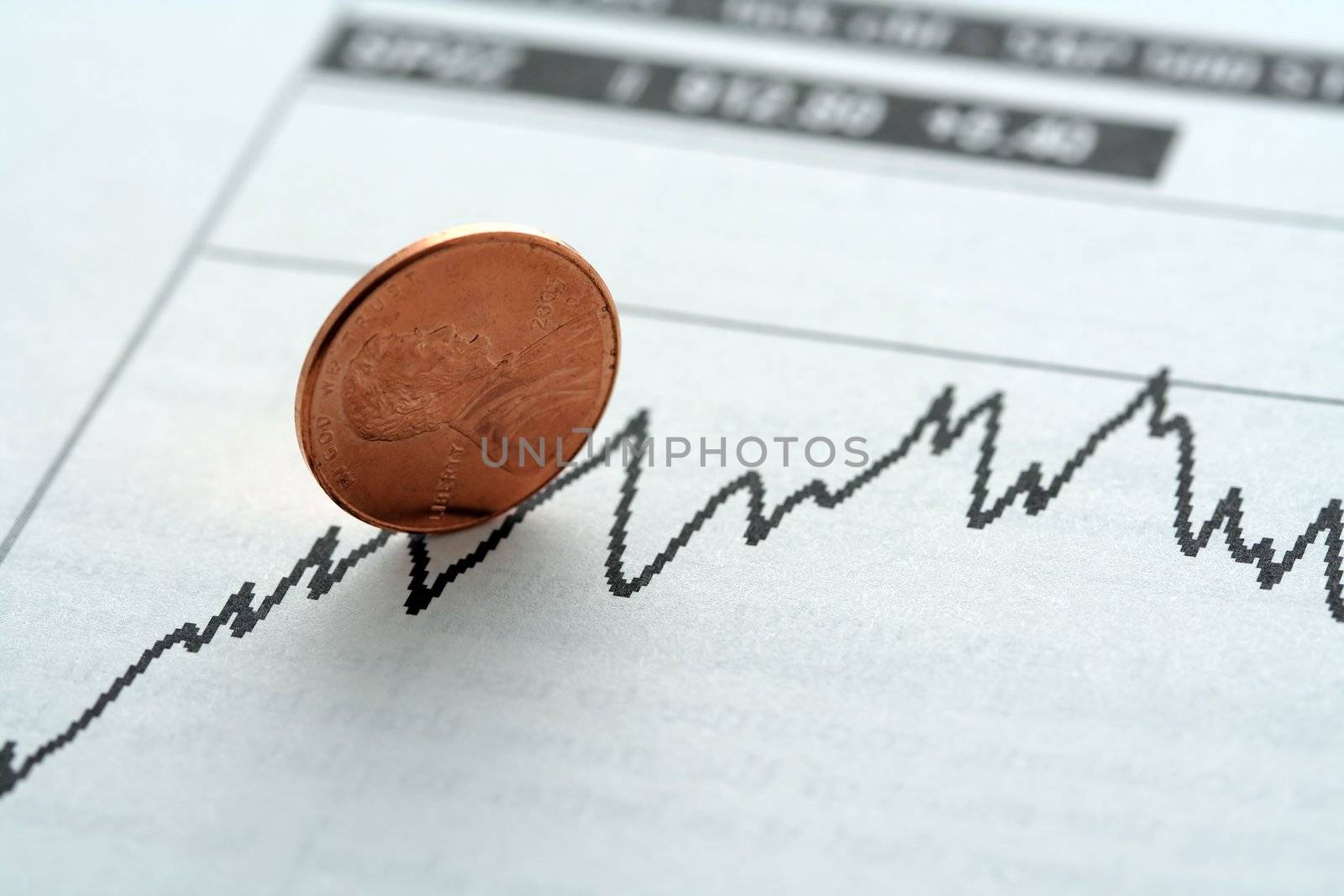 Stock graph with upward trend, symbolized with a penny