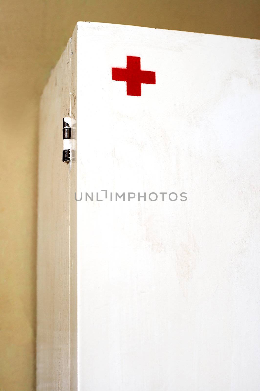 The first-aid set on a brown wall