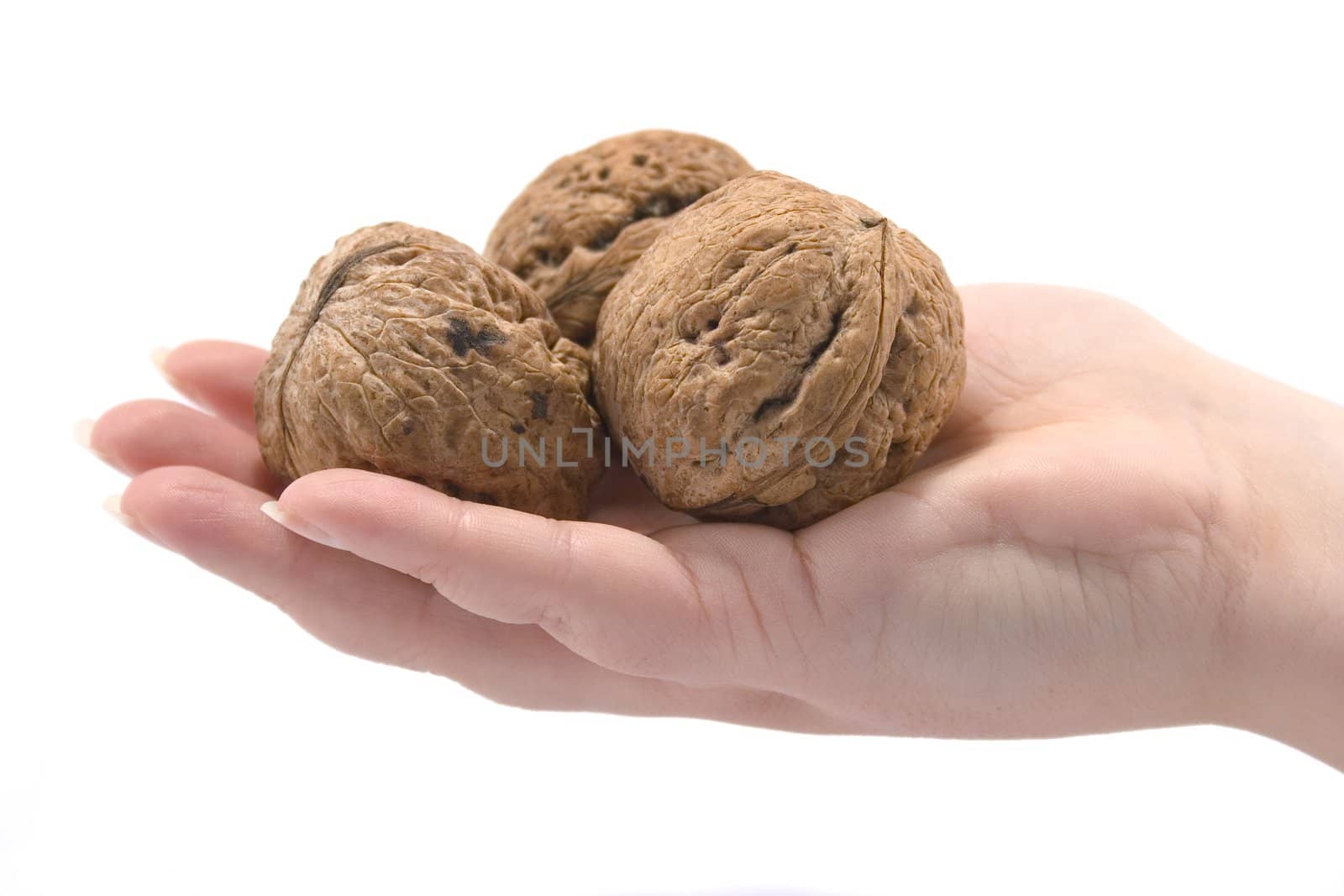 hand witn walnuts