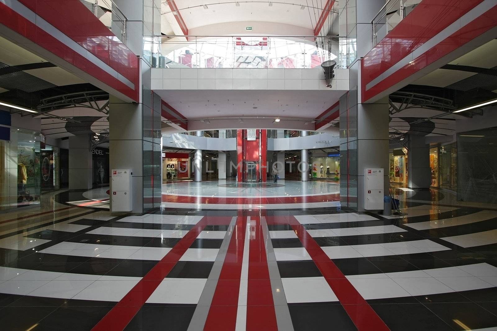 Interior of huge modern shopping centre
