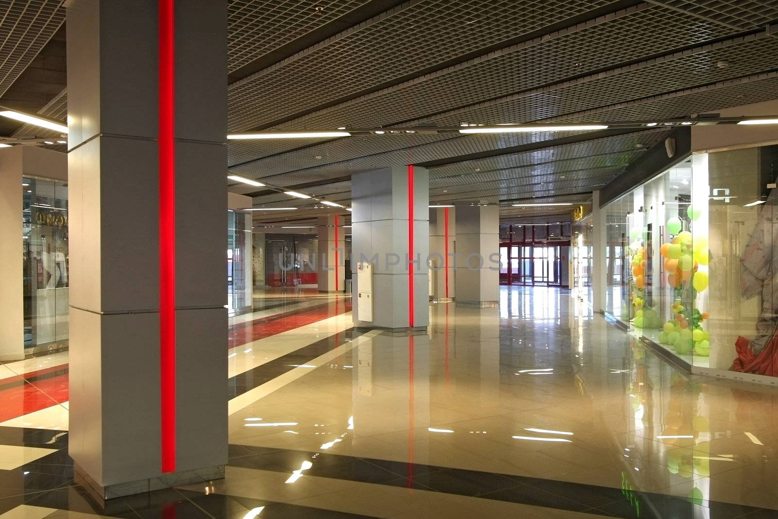 Interior of huge modern shopping centre
