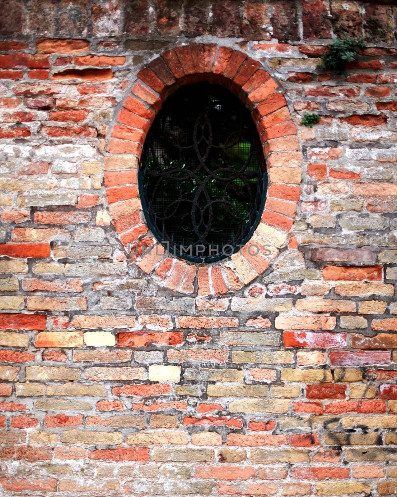 Window on redbrick background