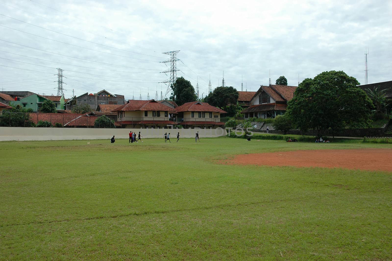 baseball field with nice green grass and blue sky
