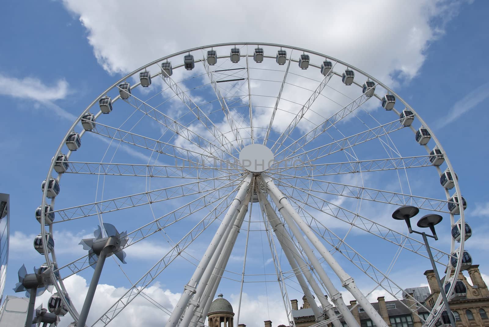 A Fairground Wheel on a city shopping plaza