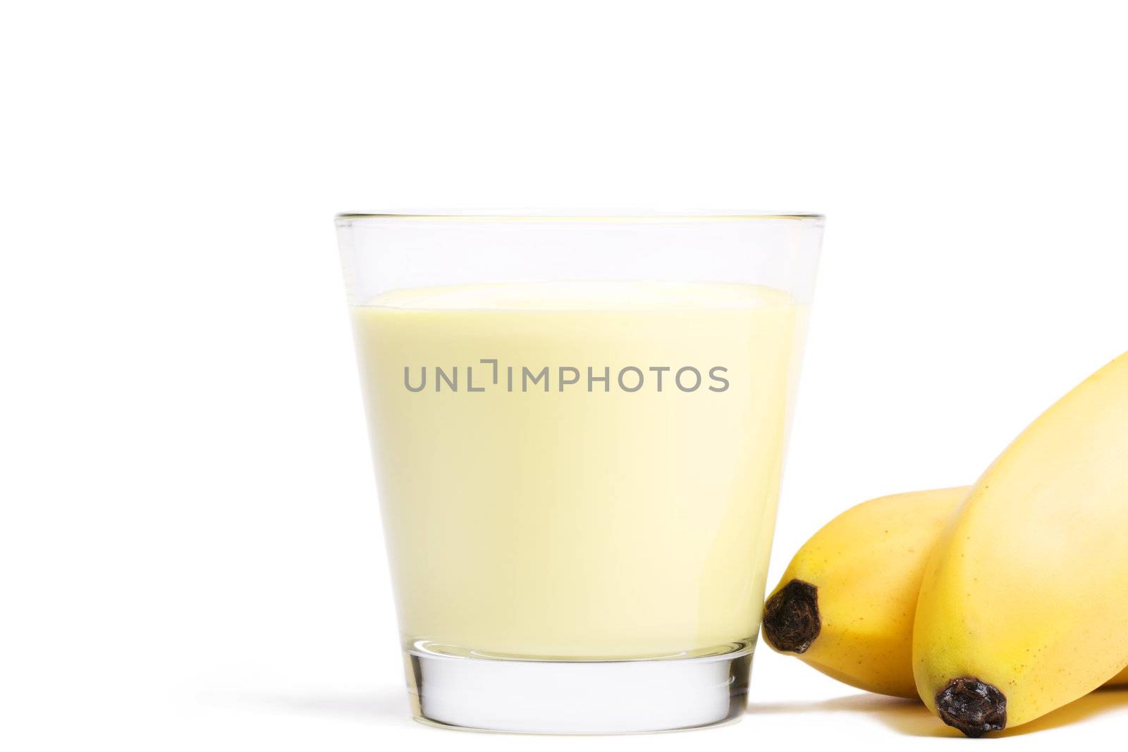 banana milkshake with bananas aside on white background