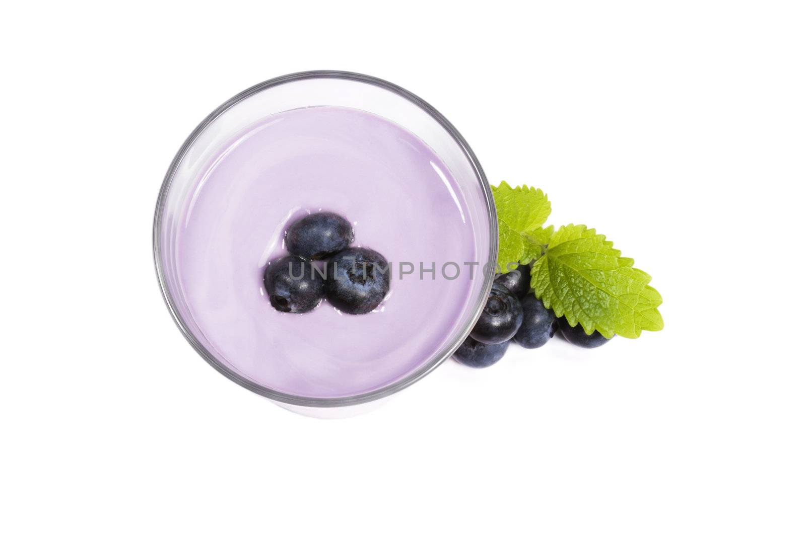blueberries on top of a blueberry milkshake with blueberries aside by RobStark