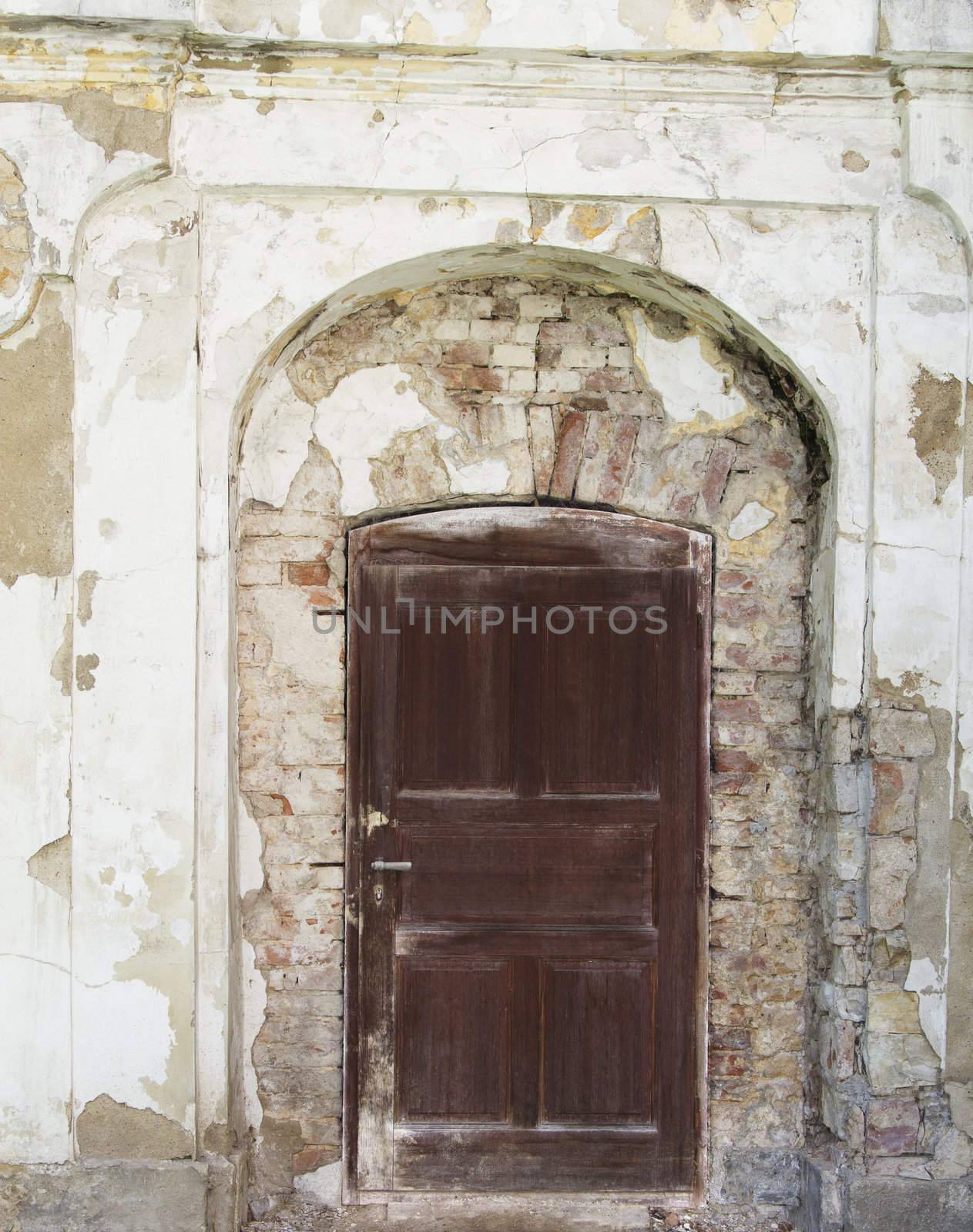 background of a straight wooden door in a aslope wall