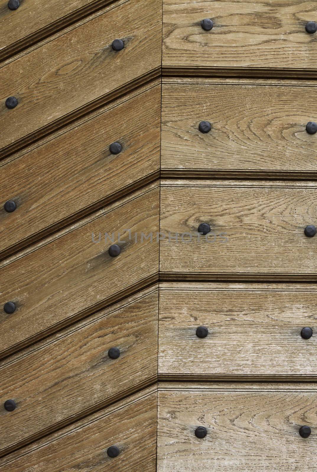 wooden background or texture with iron rivets