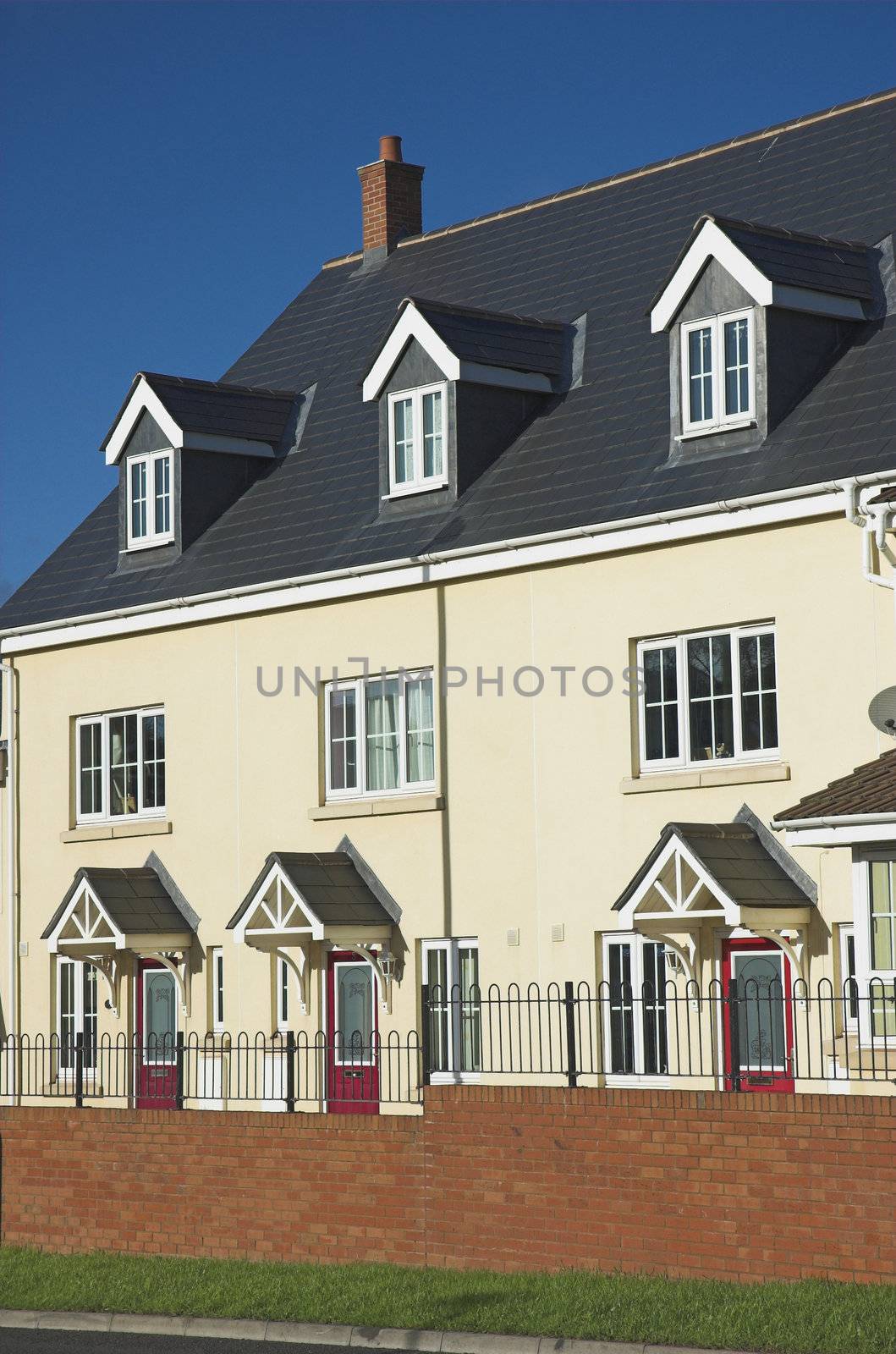 New terraced style housing in a residential estate in the United Kingdom.