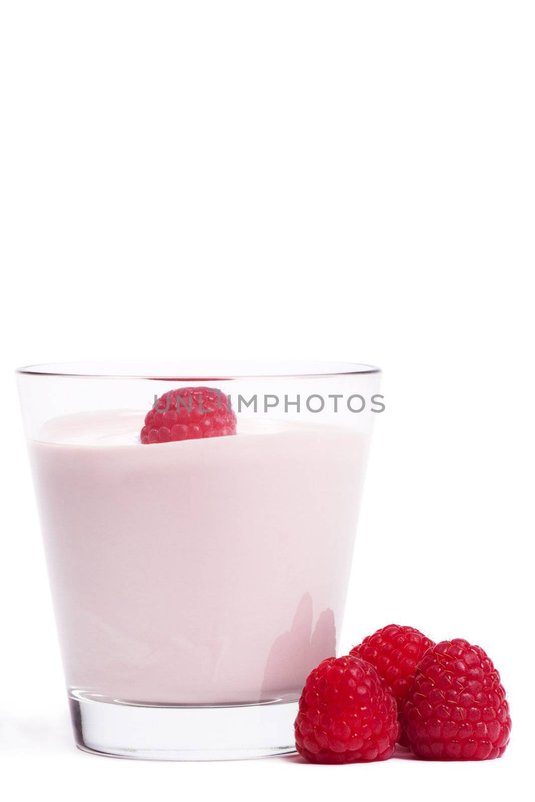 raspberry on a milkshake with raspberries aside by RobStark