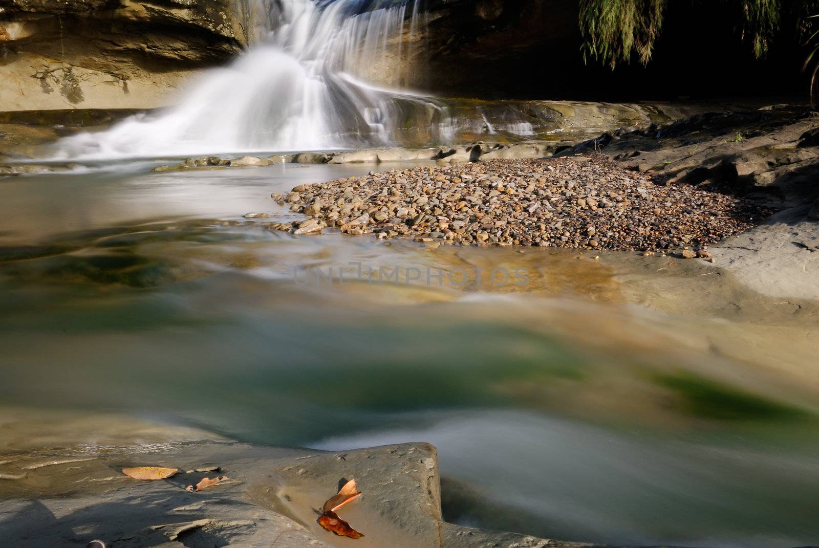 It is a beautiful waterfall from the river.