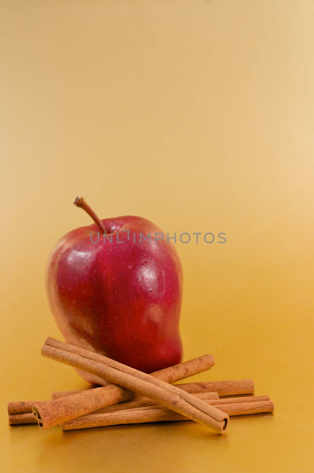 Apple with Cinnamon Sticks by shalomyoseph