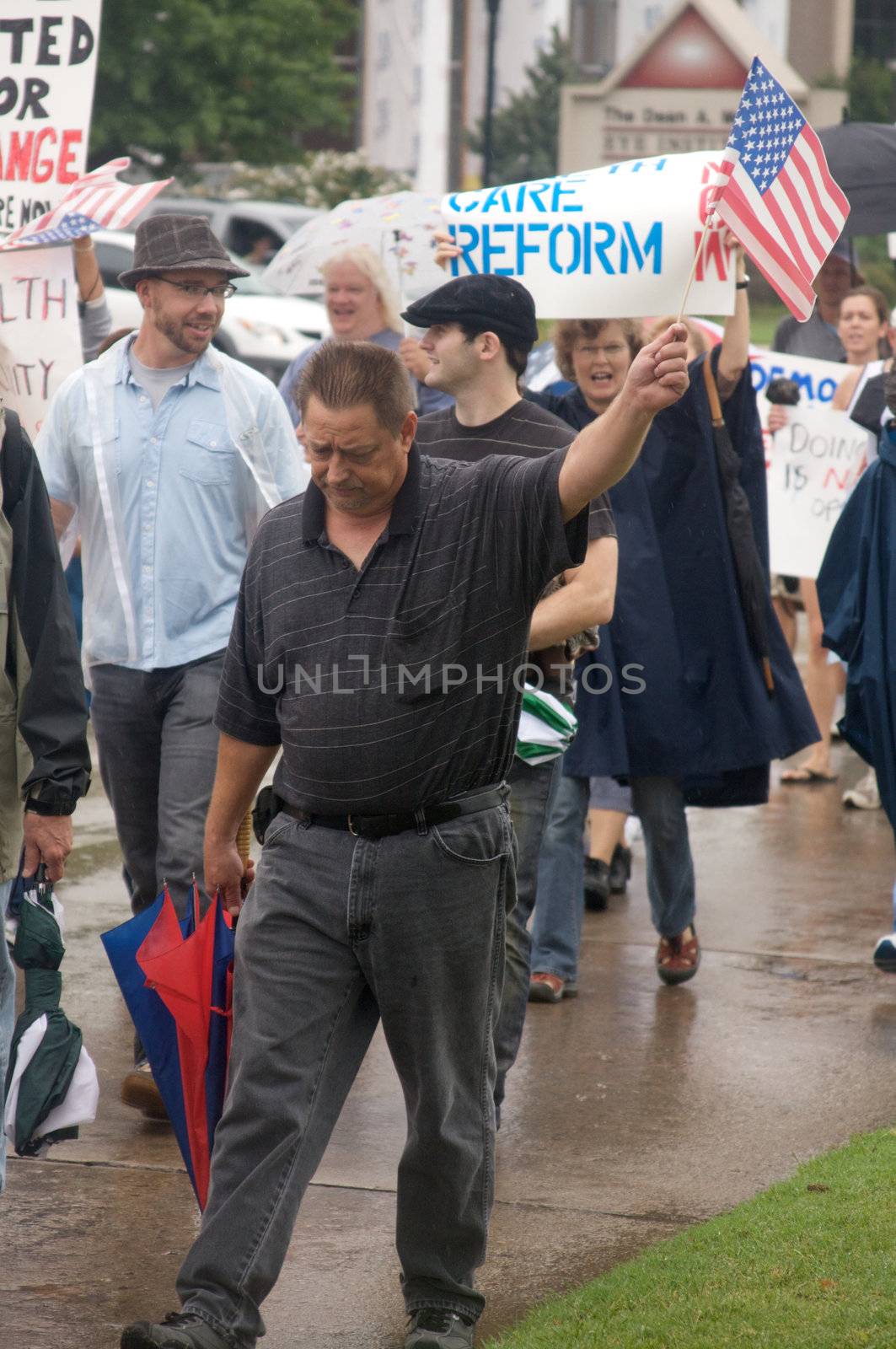 OKLAHOMA CITY, OK - SEPTEMBER 13, 2009: Protesters march to the Oklahoma capitol building to demonstrate their support for health care reform on September 13, 2009 in Oklahoma City, Oklahoma.