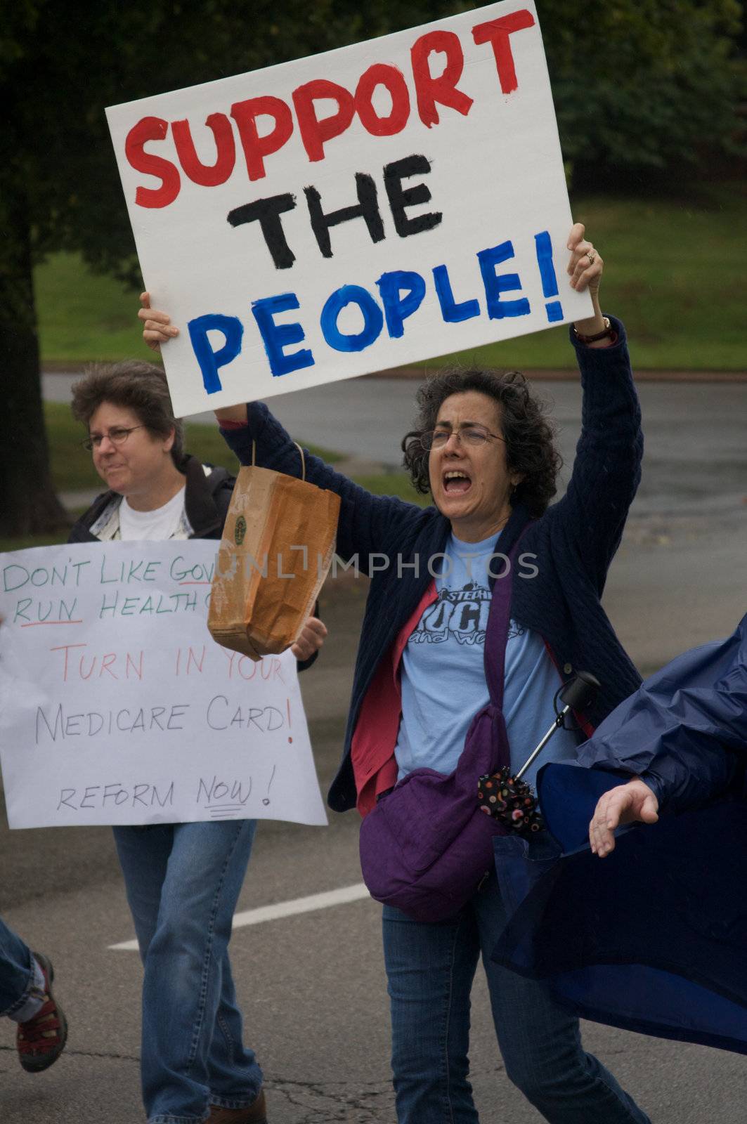 OKLAHOMA CITY, OK - SEPTEMBER 13, 2009: Protesters march to the Oklahoma capitol building to demonstrate their support for health care reform on September 13, 2009 in Oklahoma City, Oklahoma.