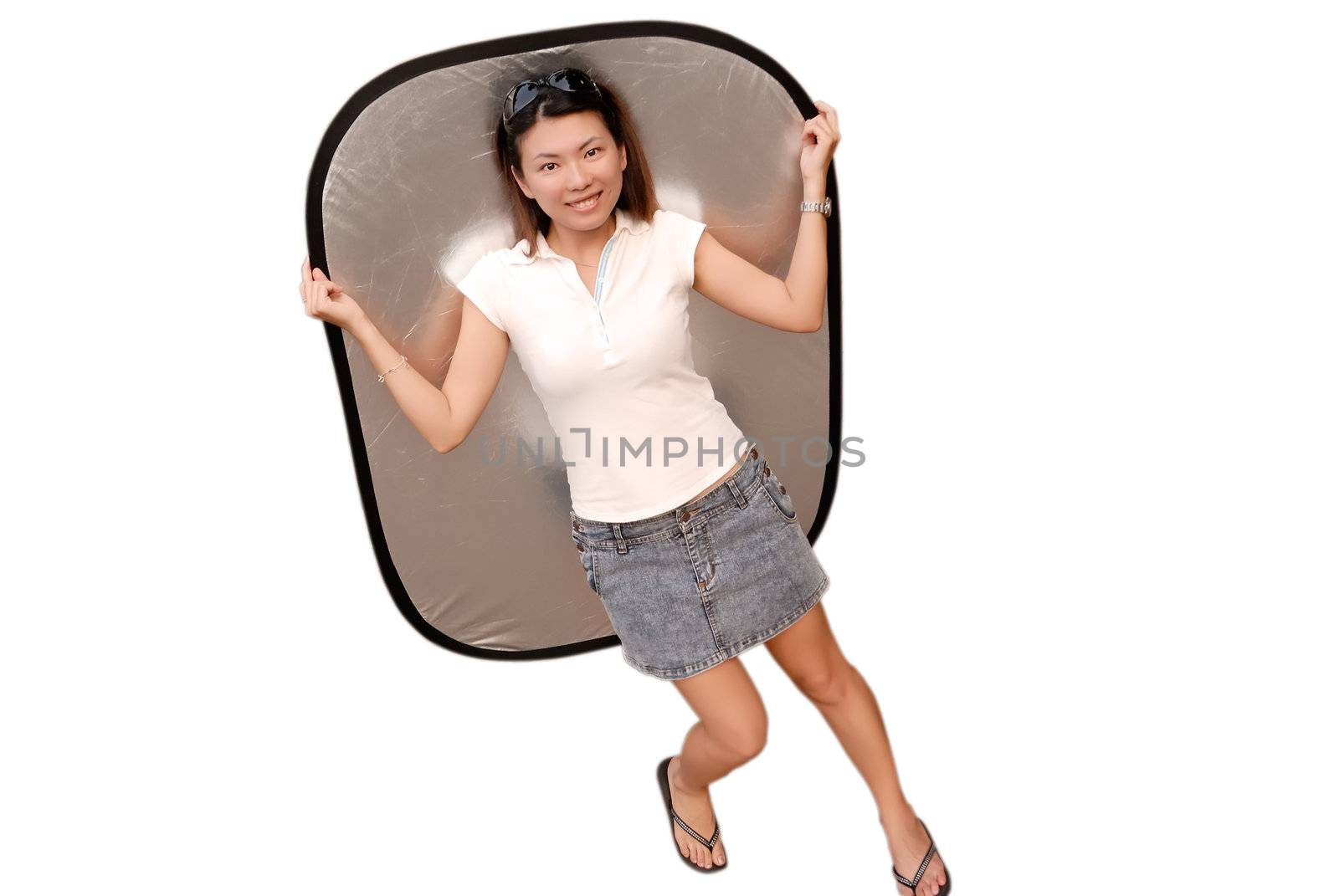 There is a cute asian lady with reflector in white background.