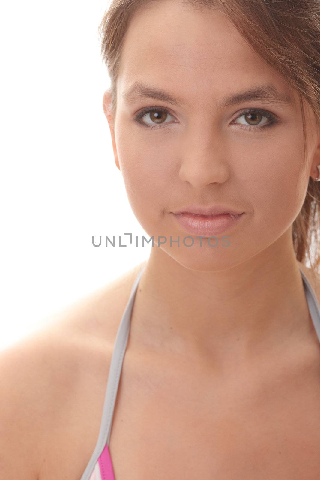 Portrait of a happy young healthy woman standing over white background