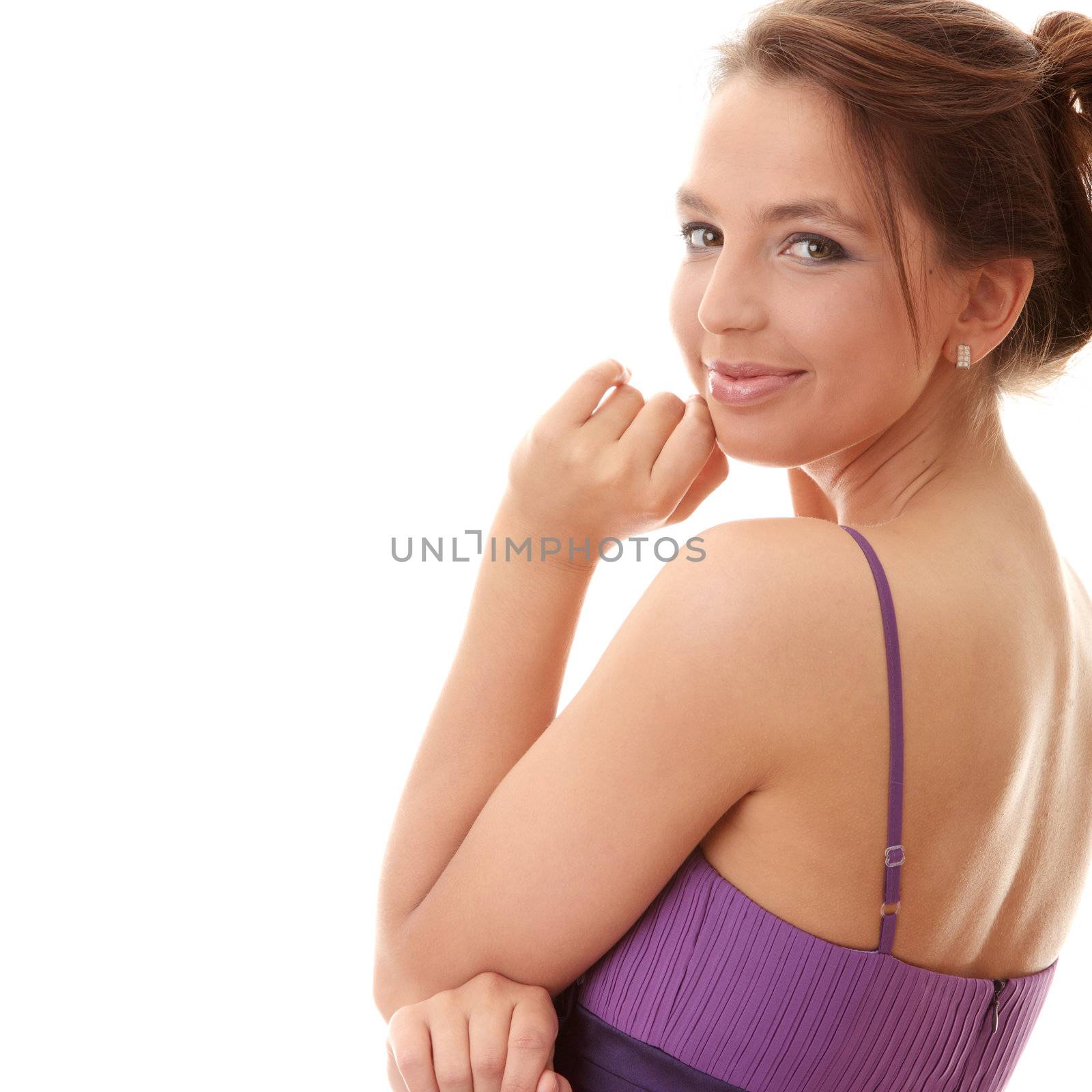 Attractive dancer girl in violet classic dress, studio shot