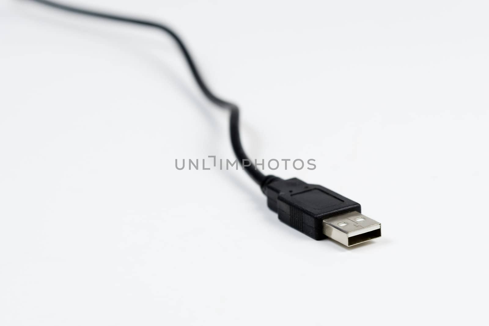 Black usb cable on white backround