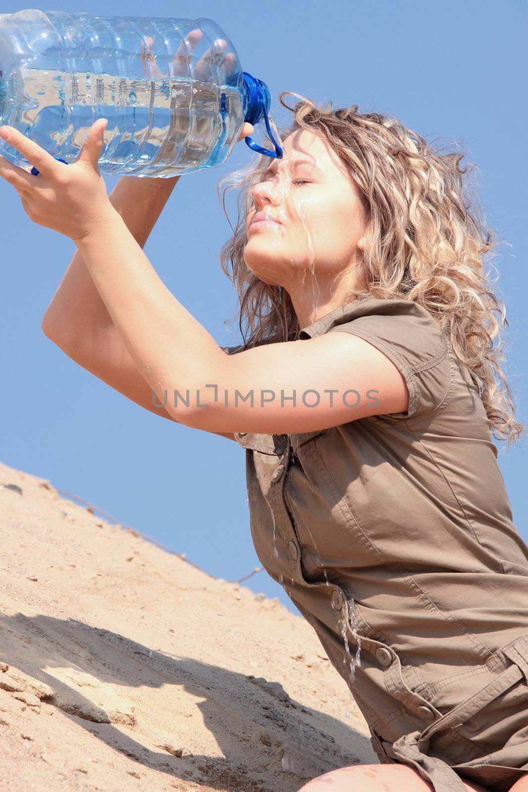 Thirsty blond woman on desert by BDS