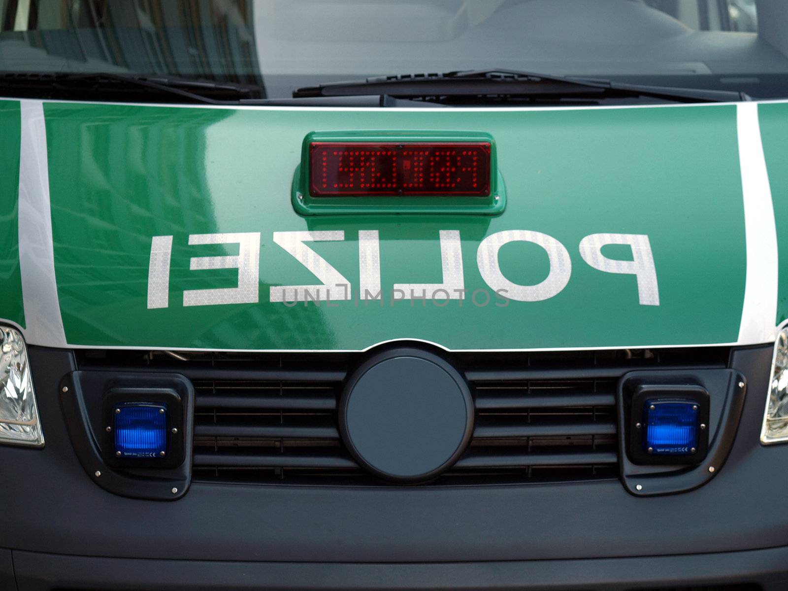 Typical German police car with reversed mirrored text "polizei"