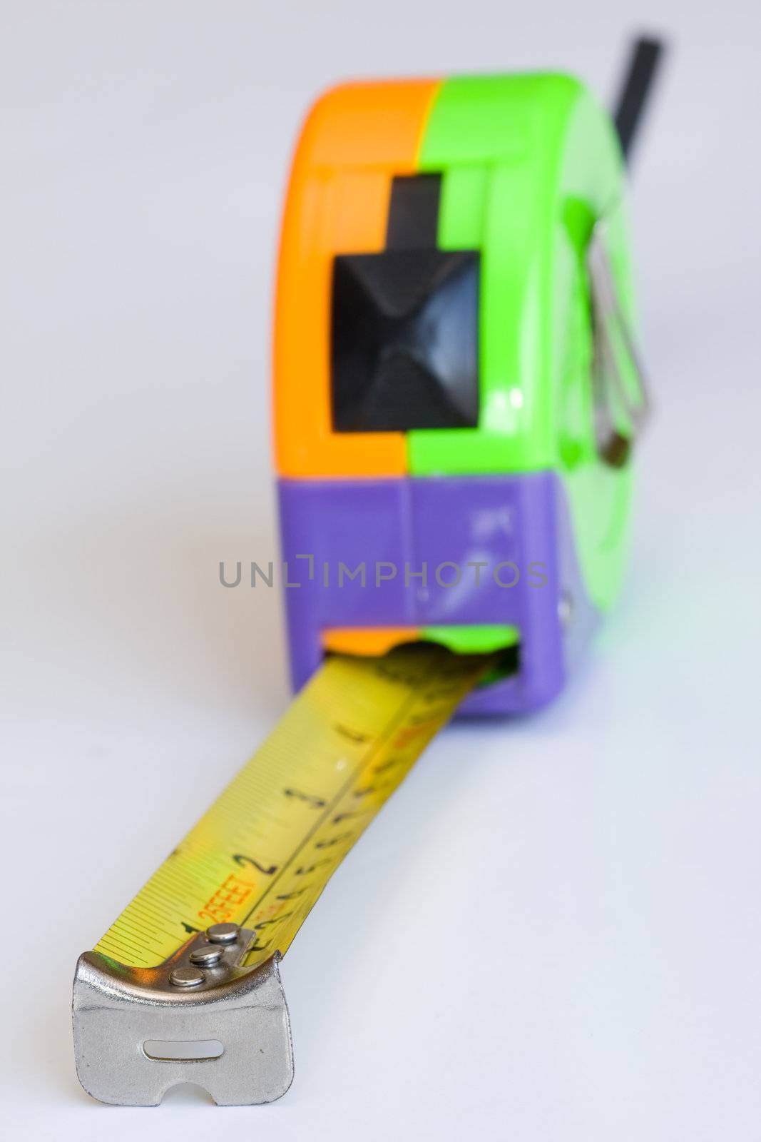 Detail of tape measure isolated against white background