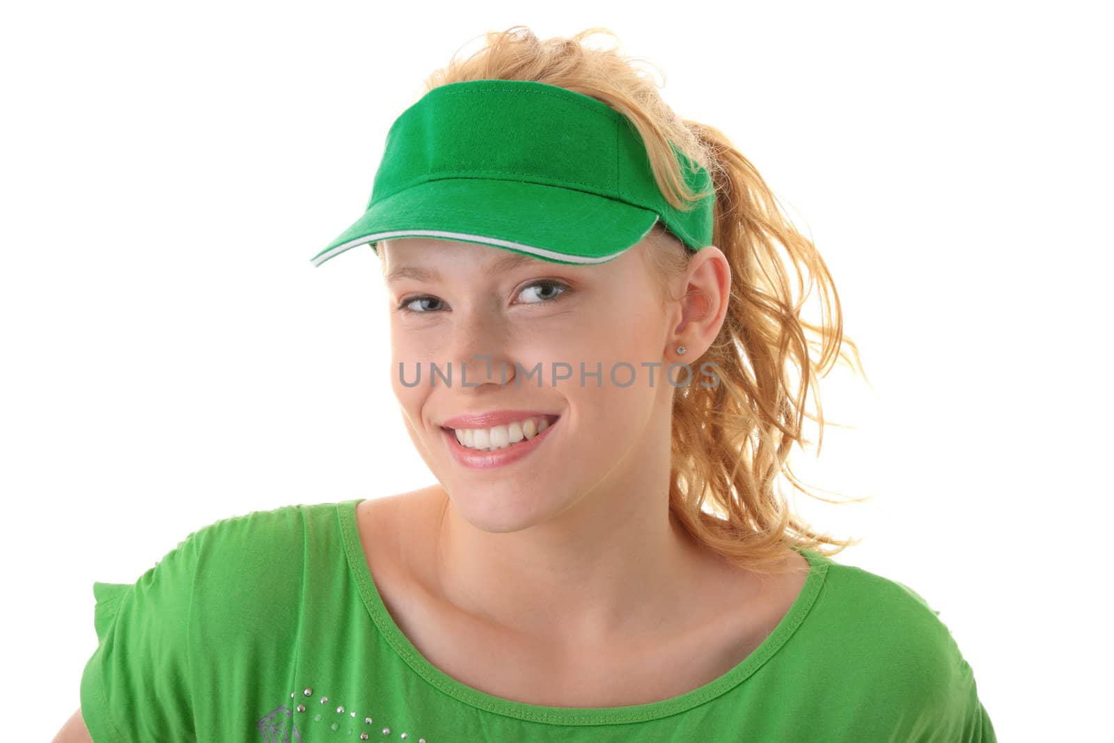 Young beautiful blond woman with green cap isolated on white background