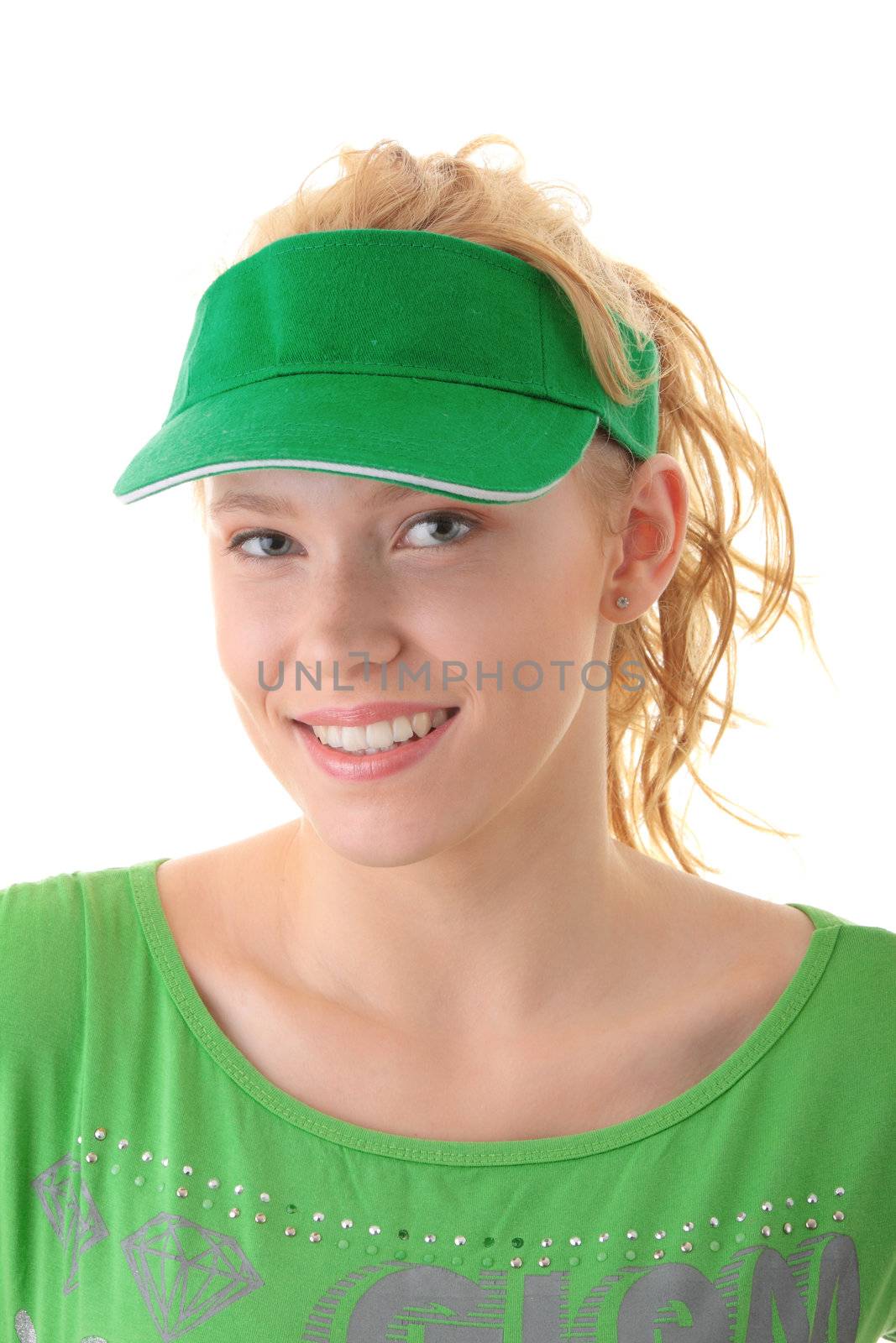 Young beautiful blond woman with green cap isolated on white background