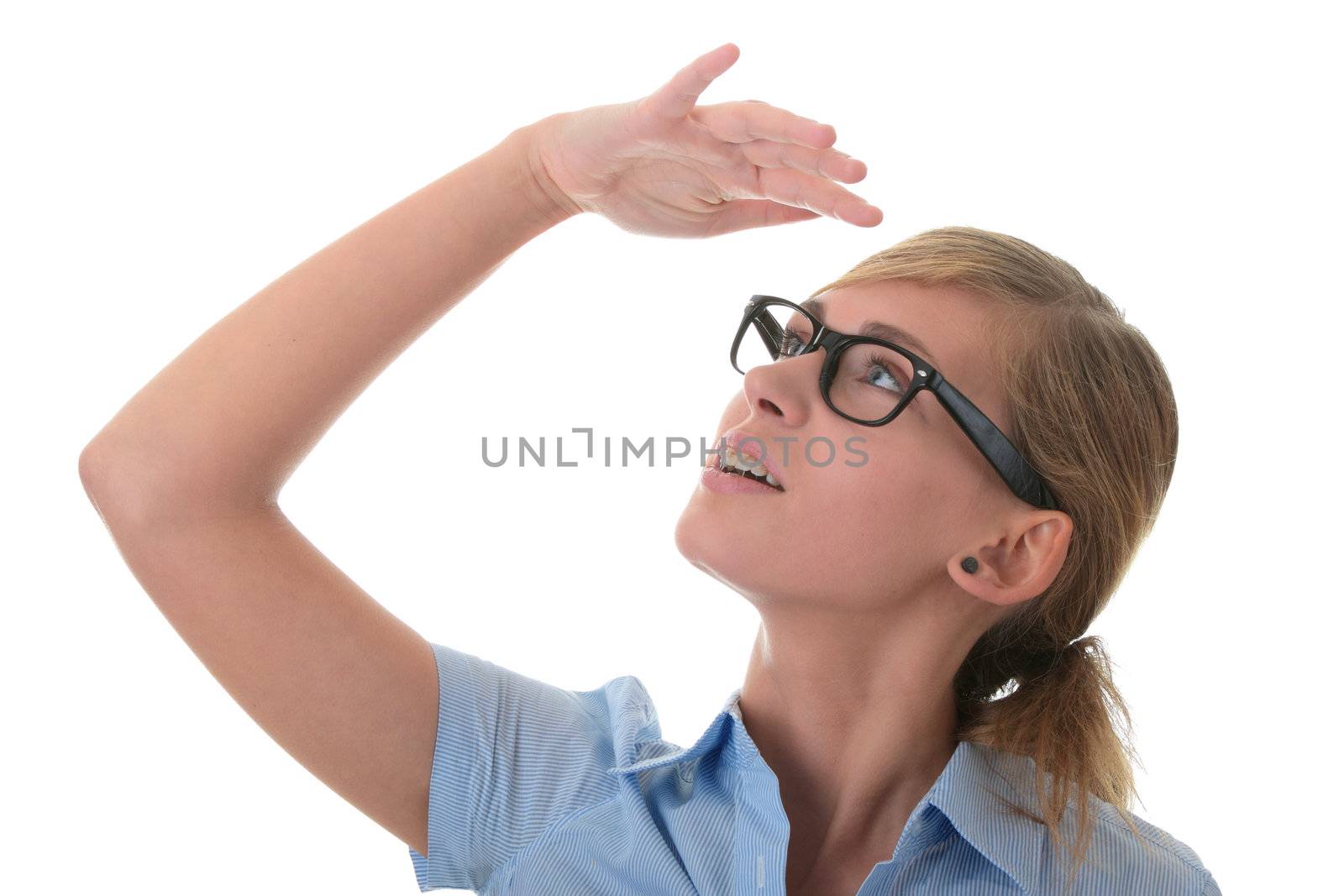 Portrait of a thoughtful young woman in blue shirt and glases (student, secretary or buisnesswoman)