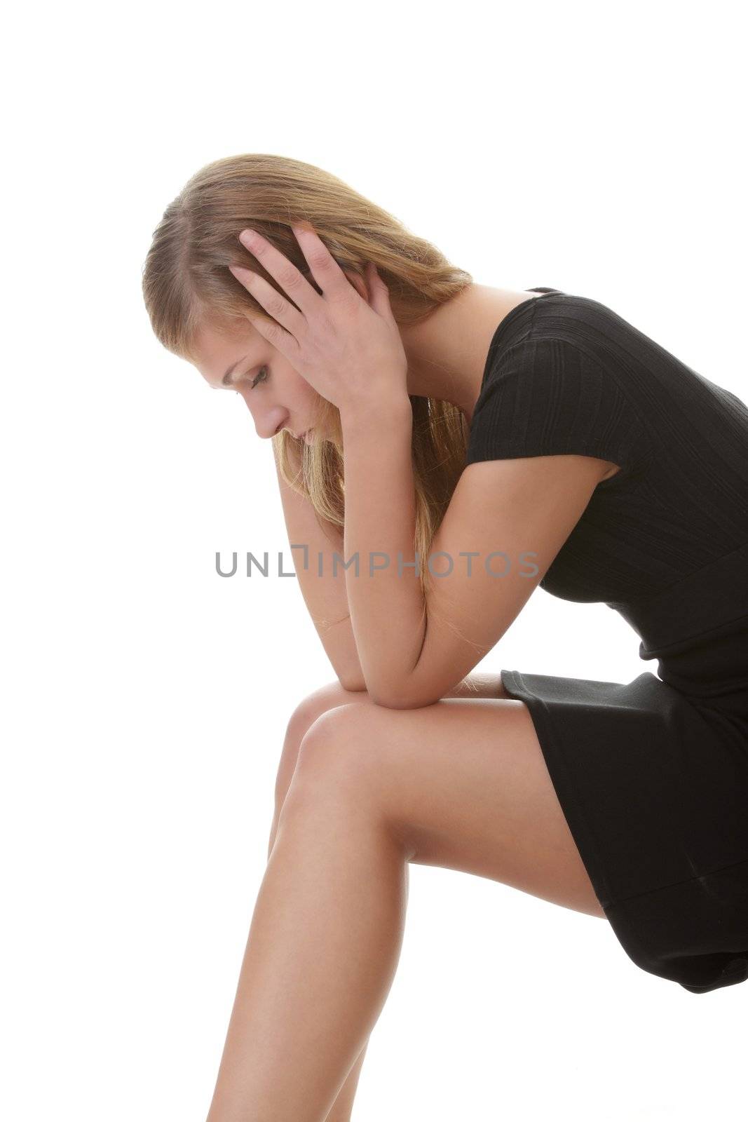 Beautiful young woman depressed - isolated on white background