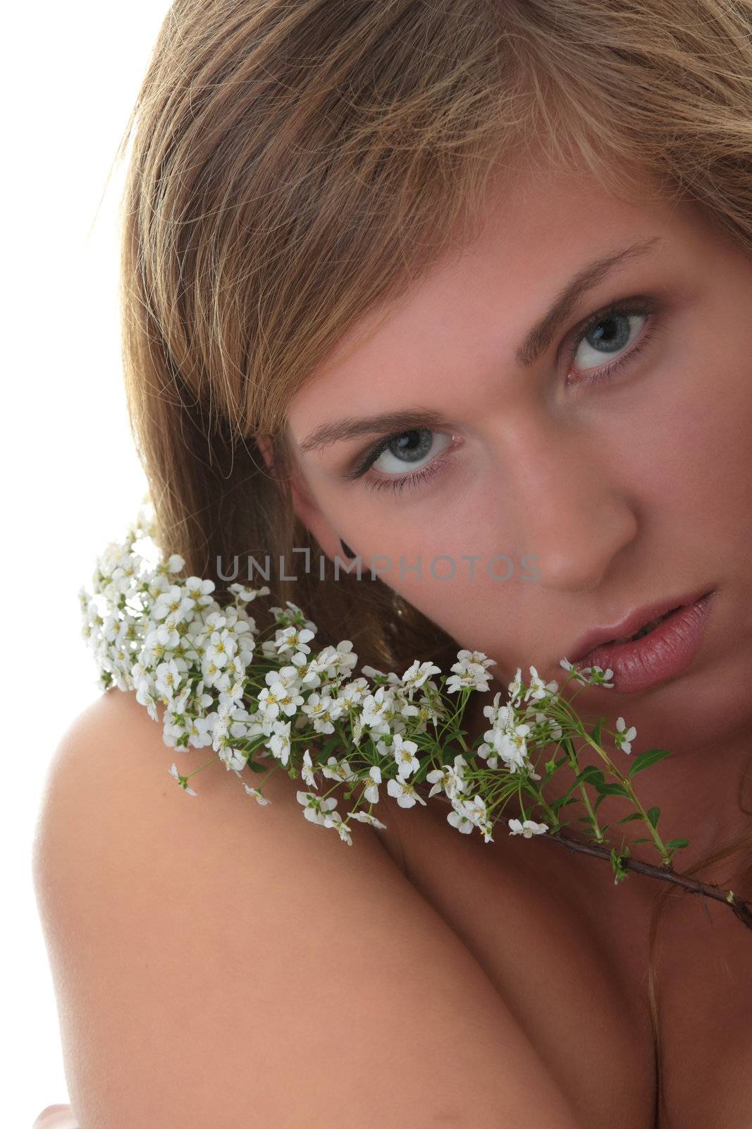 Beautiful blond woman with small white flowers isolated on white background