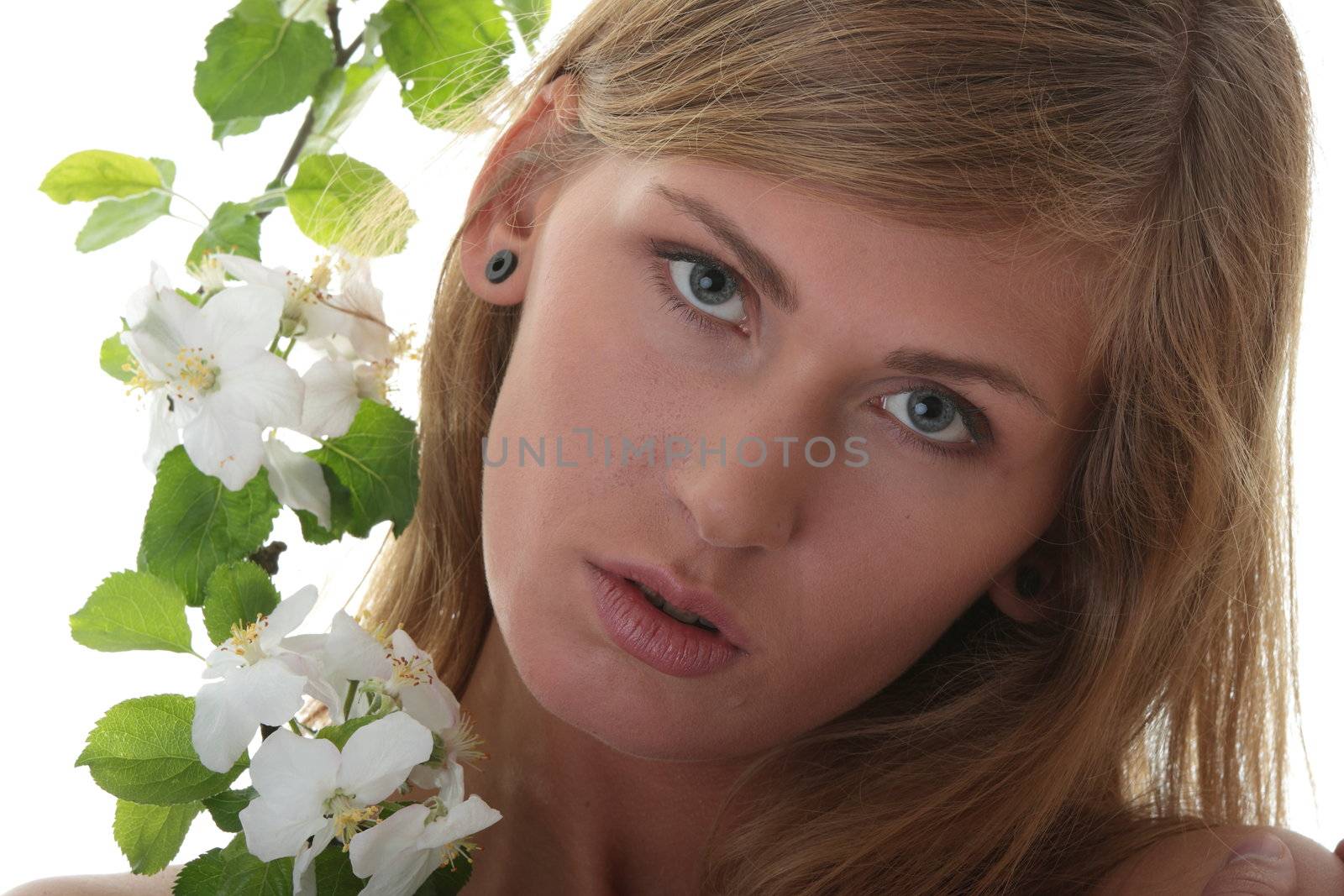 Beautiful blond woman with small white apple tree flowers by BDS