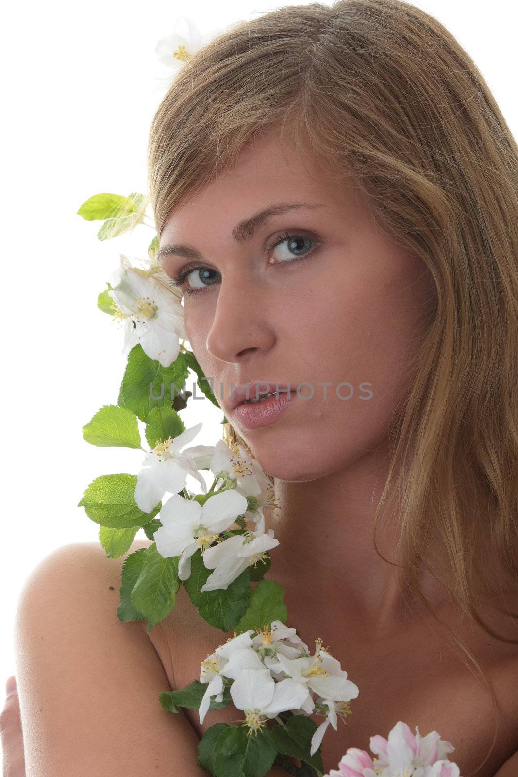 Beautiful blond woman with small white apple tree flowers isolated on white background