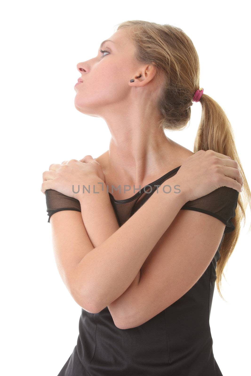 Pretty woman with slim waist pose on white background dressed in style black dress