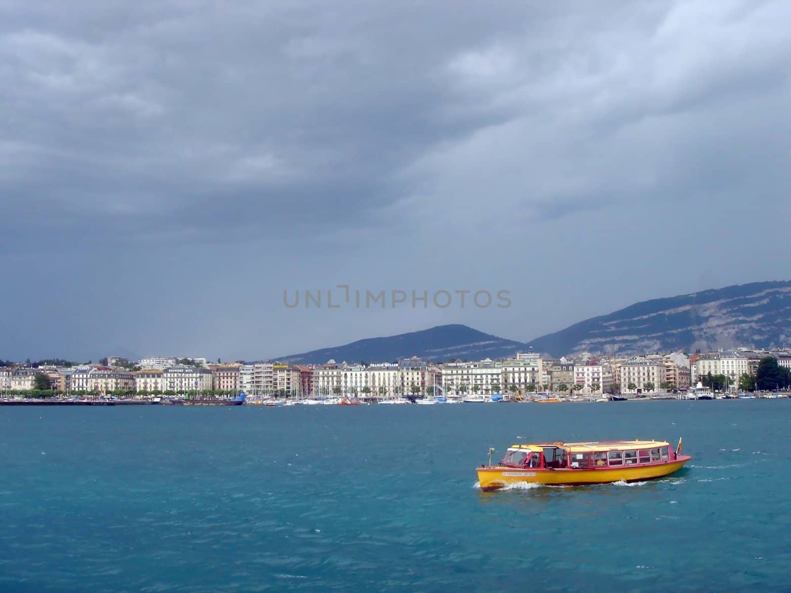 Yellow Boat On Geneva Lake By Stormy Weather by Elenaphotos21