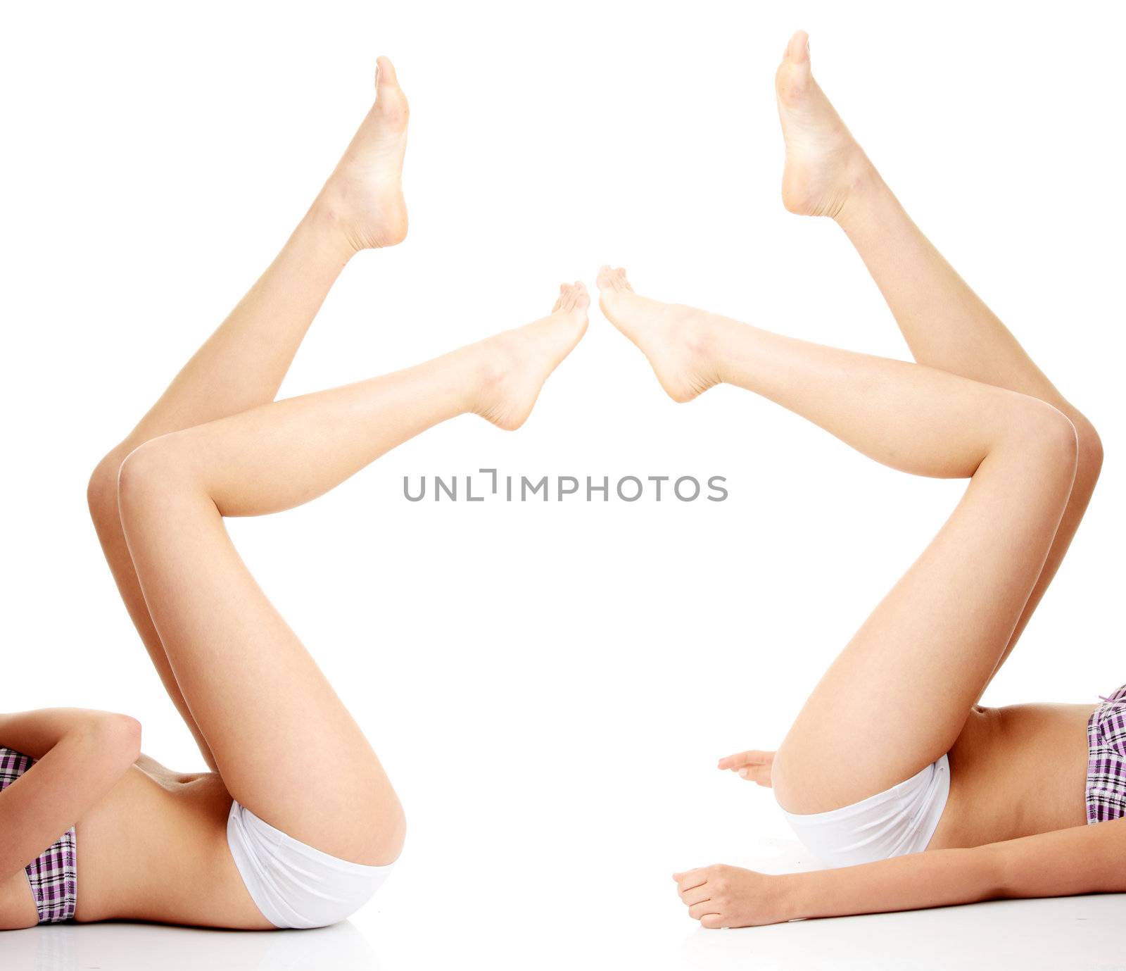 Beautiful woman legs isolated on white background