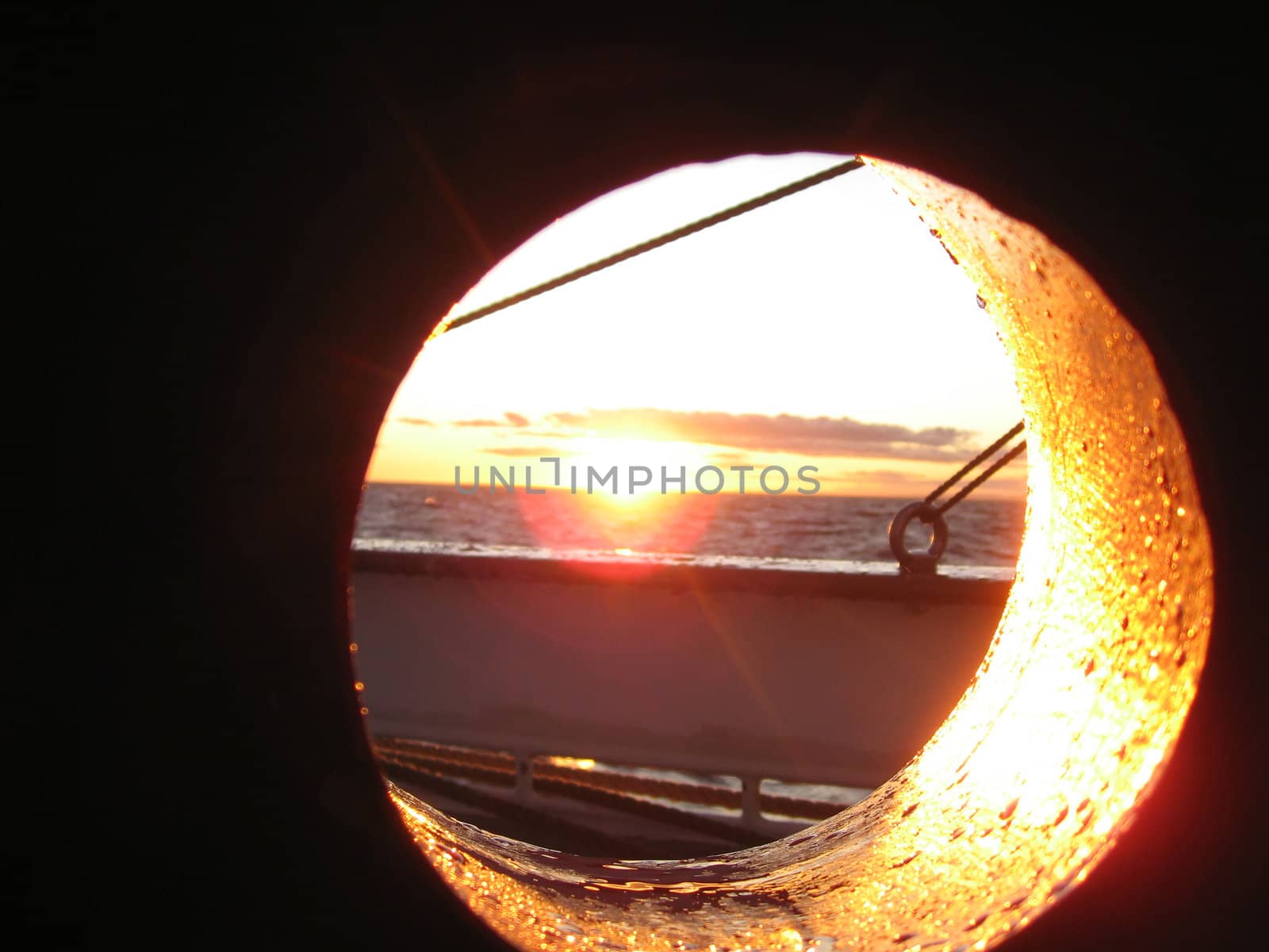 Sunset, ship on sea