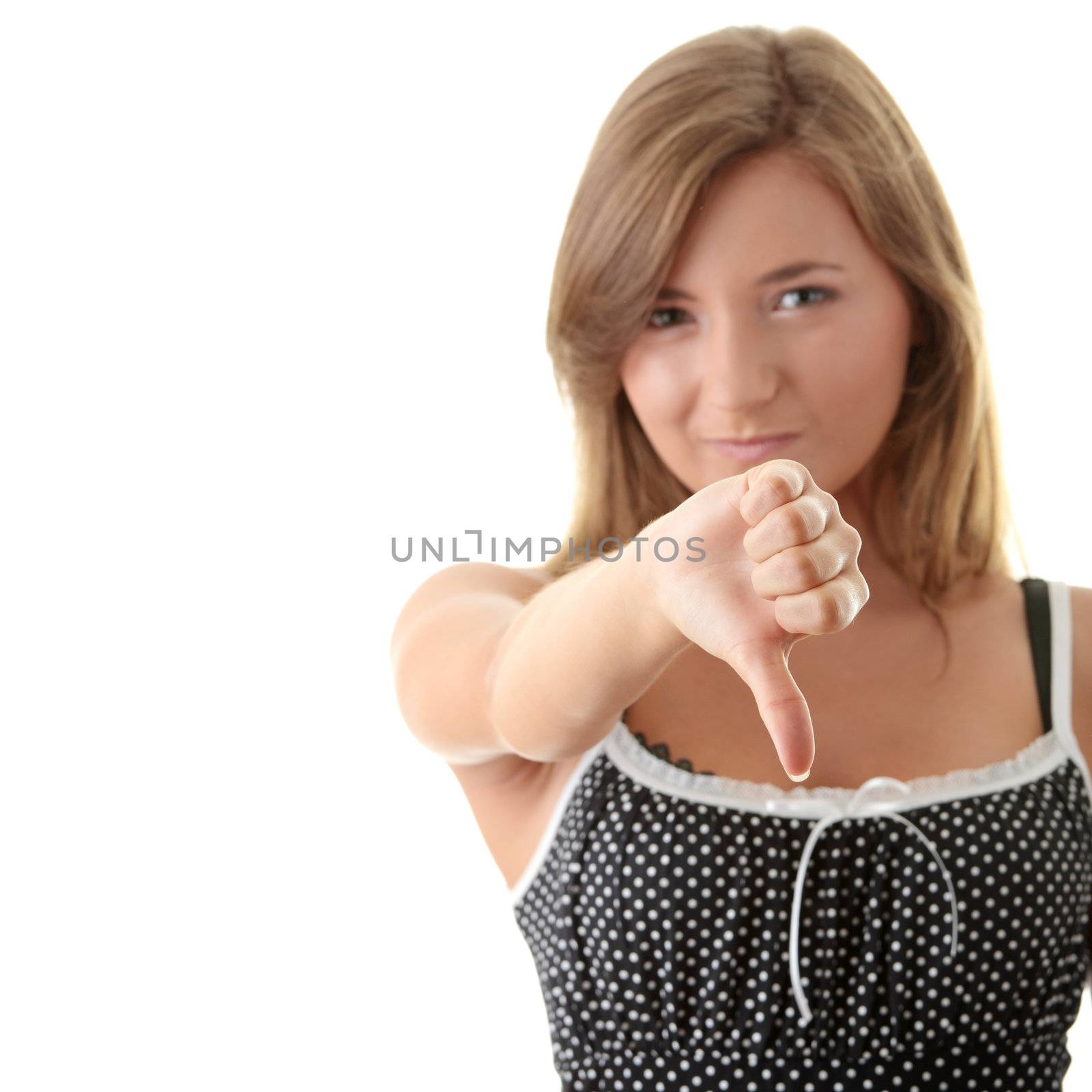 Young woman with thumb down isolated on white background